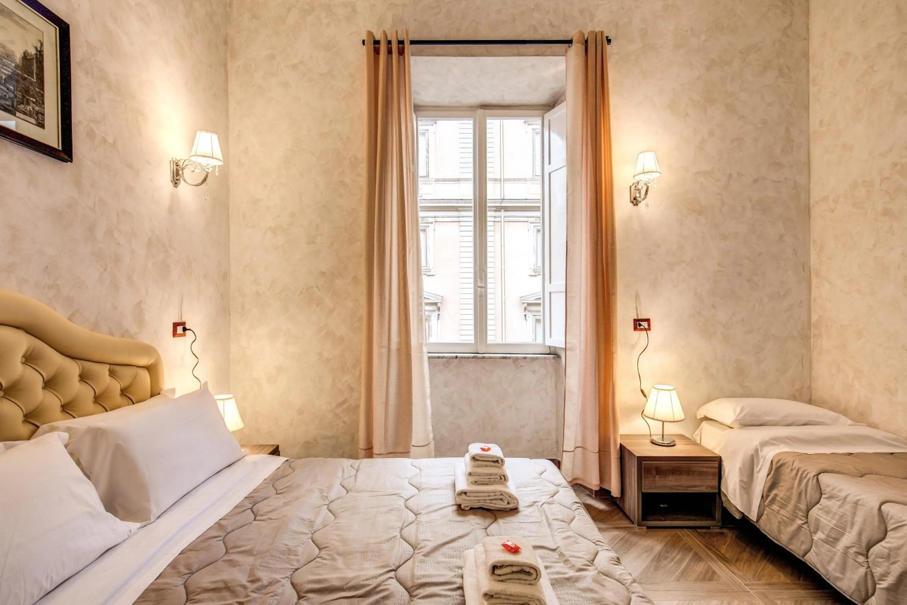 Bed in AMICI GUESTHOUSE