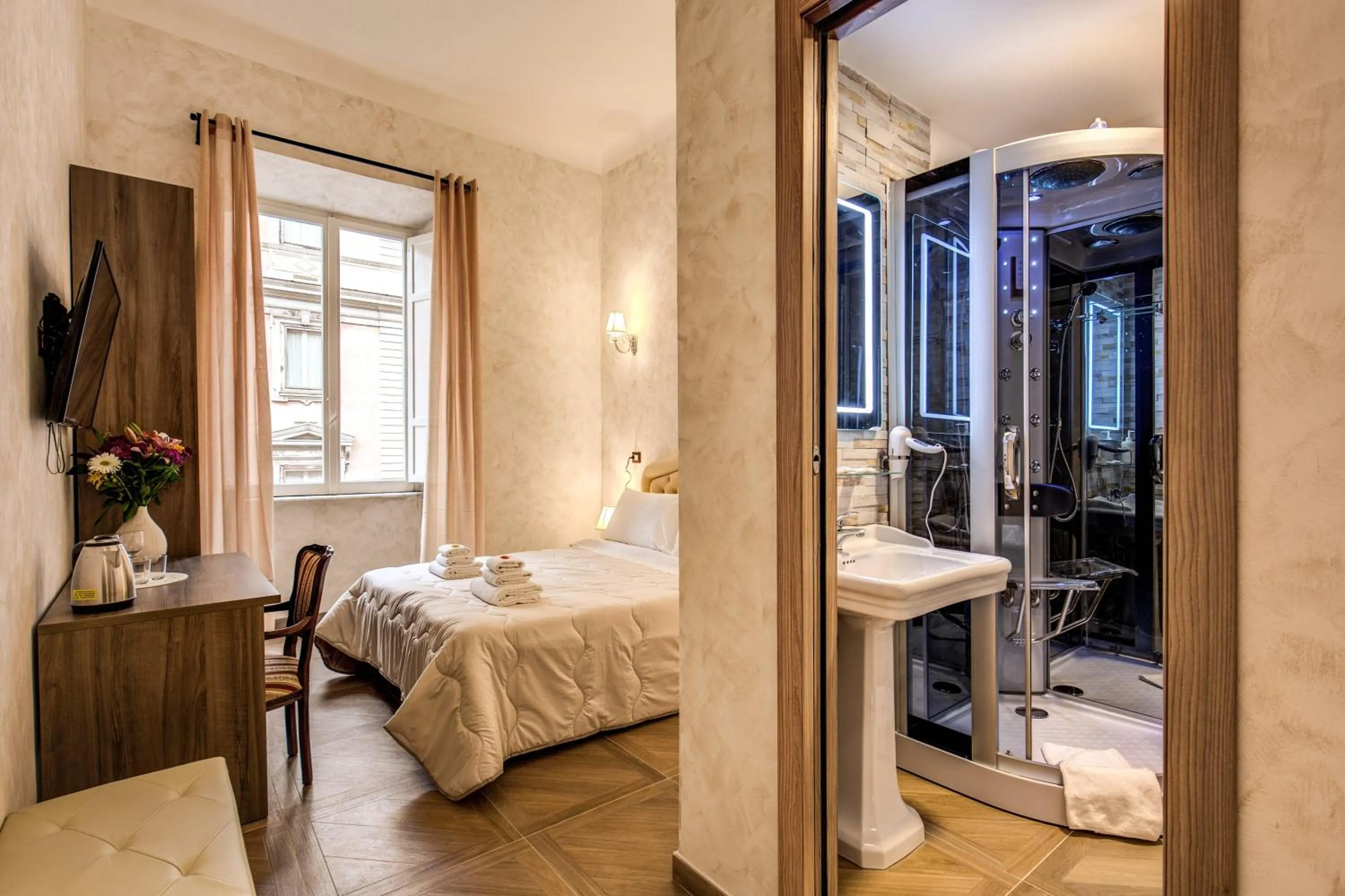 Bed in AMICI GUESTHOUSE