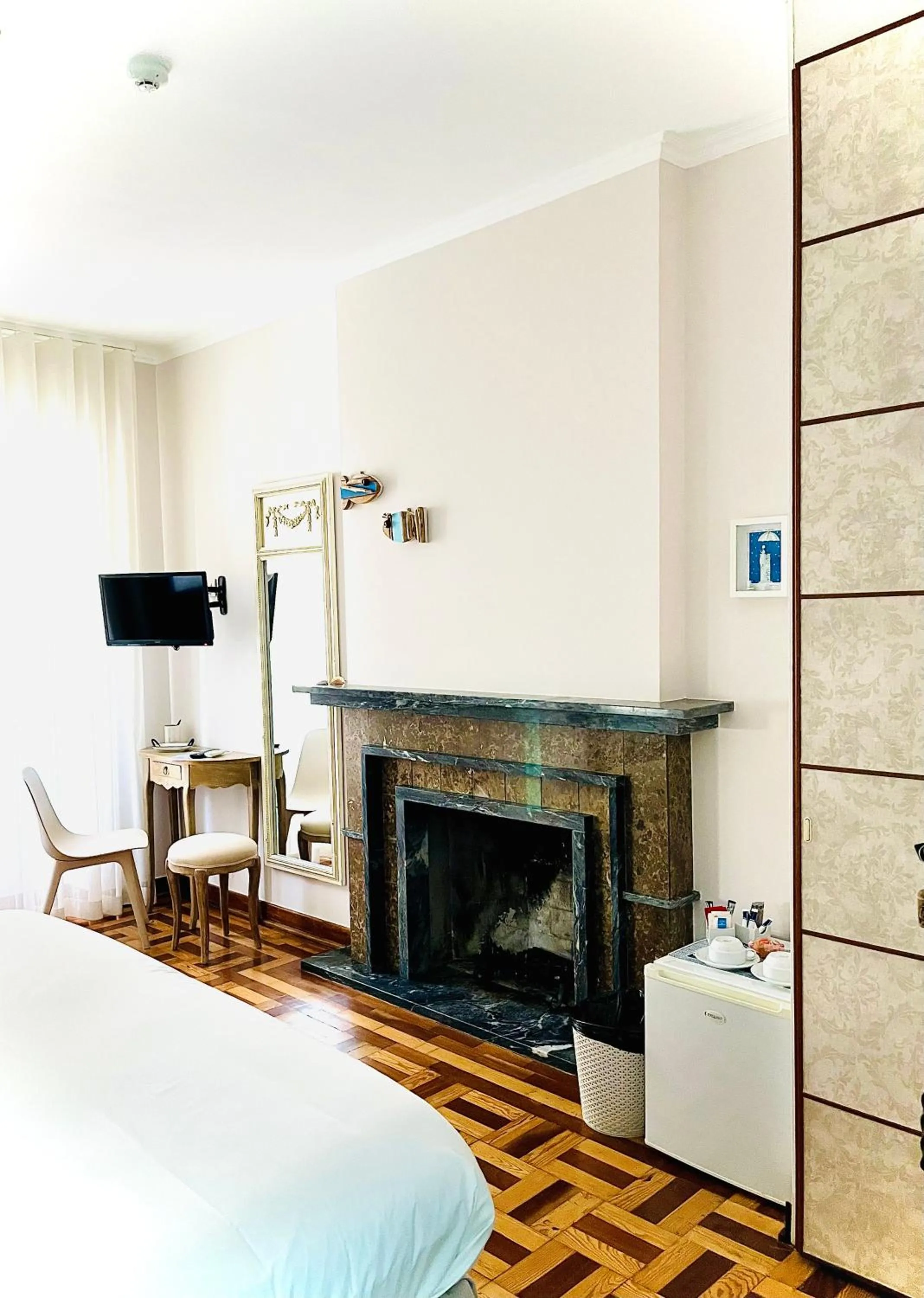 Photo of the whole room, Bed in Senhor Gigi