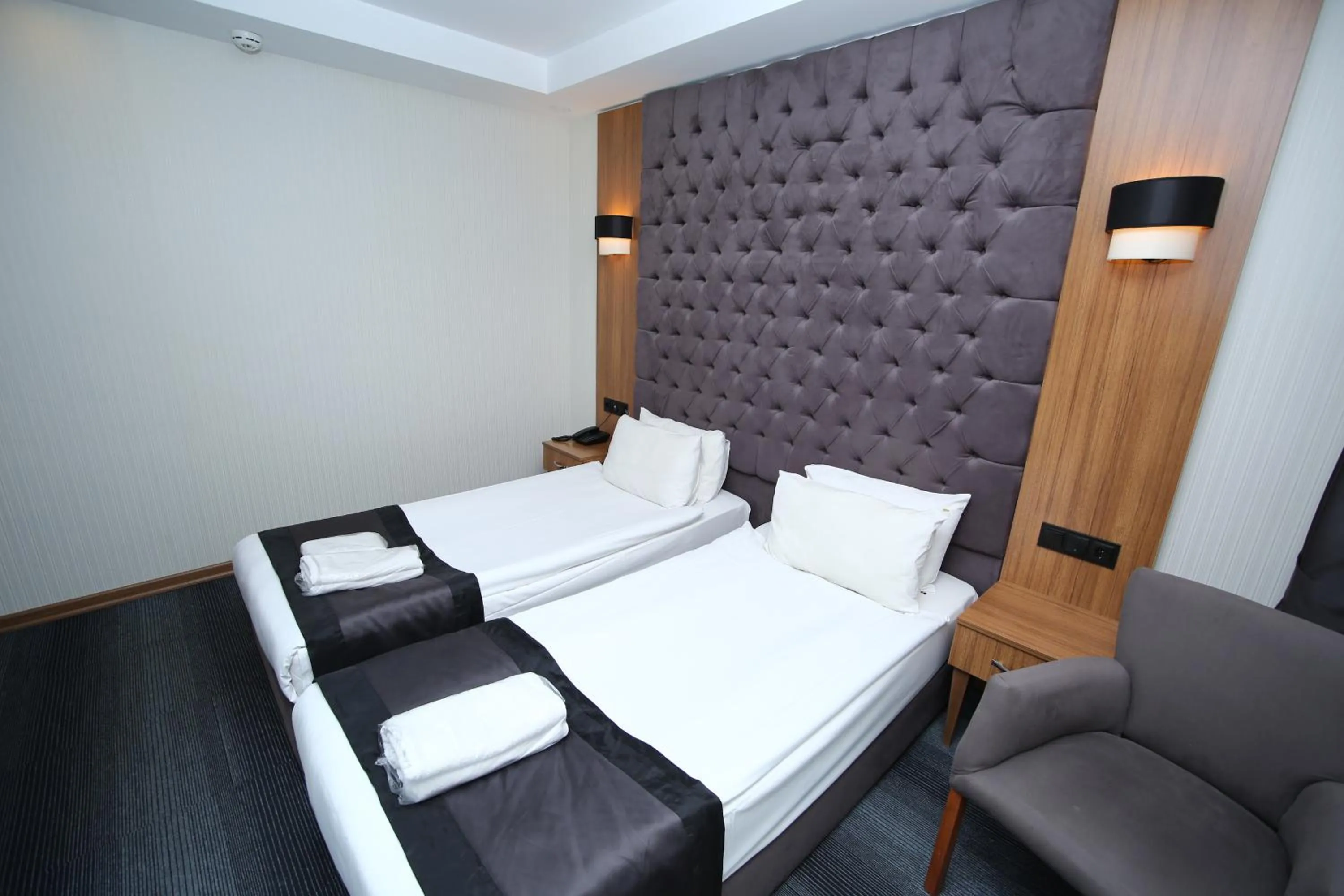 Bed in Grand Silay Hotel