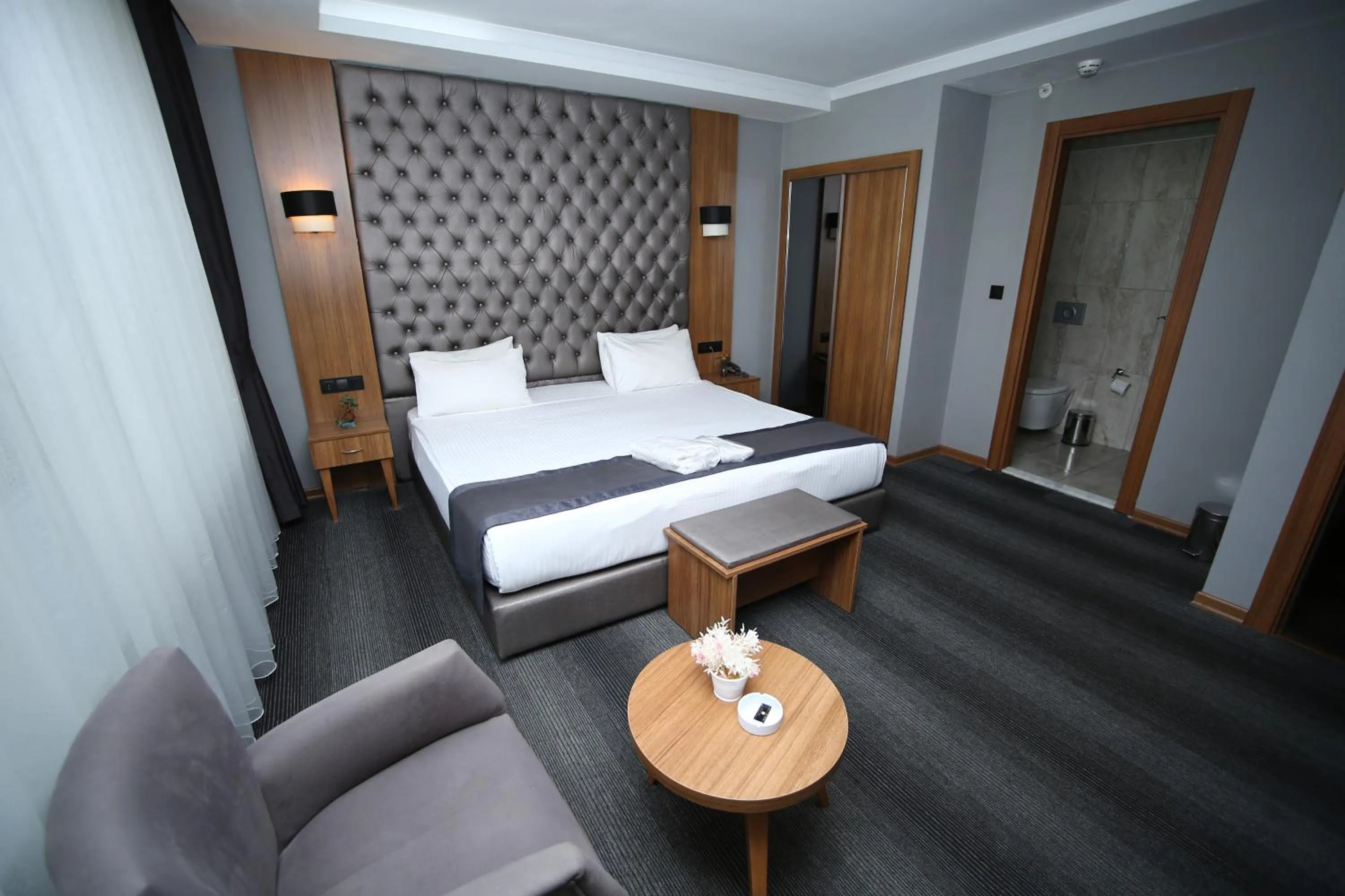 Bed in Grand Silay Hotel