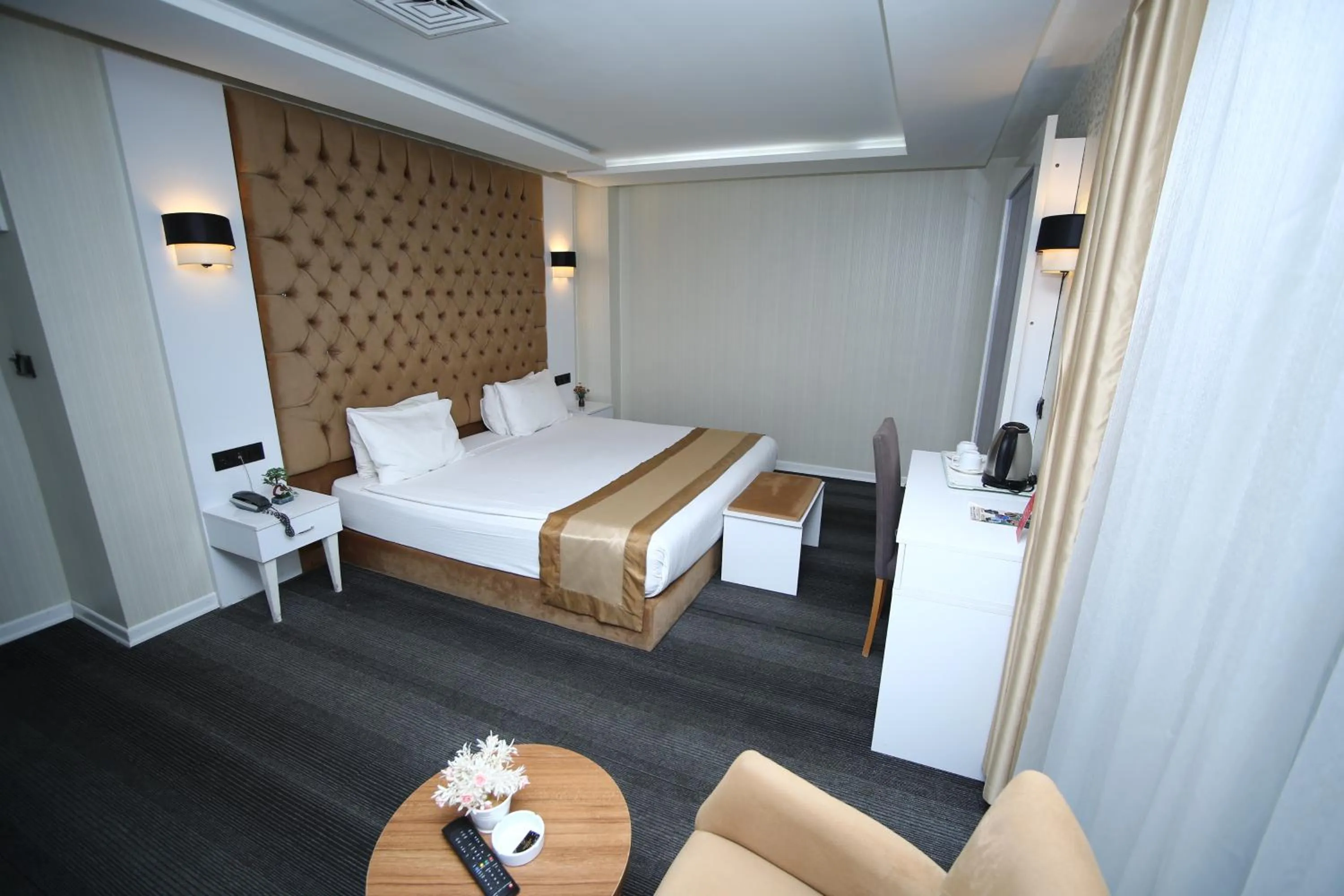 Bed in Grand Silay Hotel