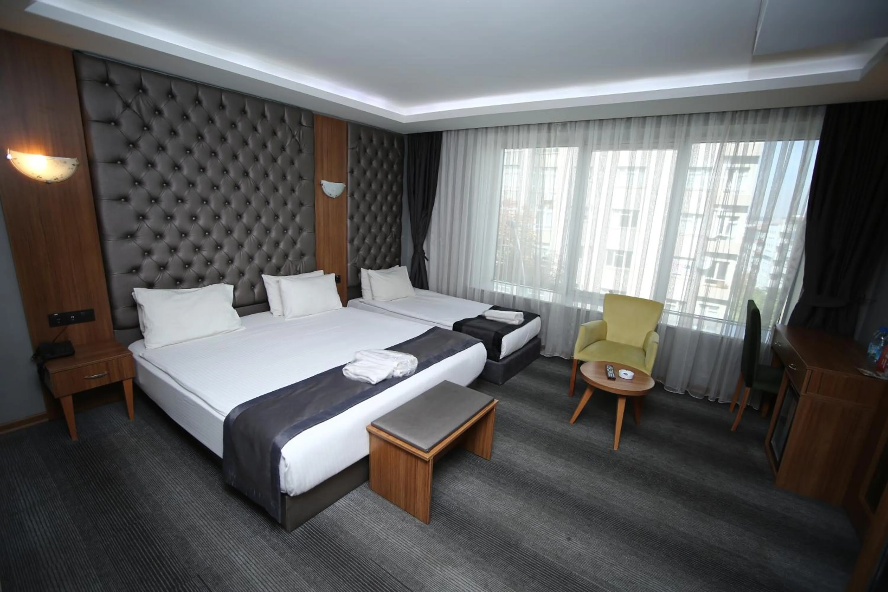 Bed in Grand Silay Hotel