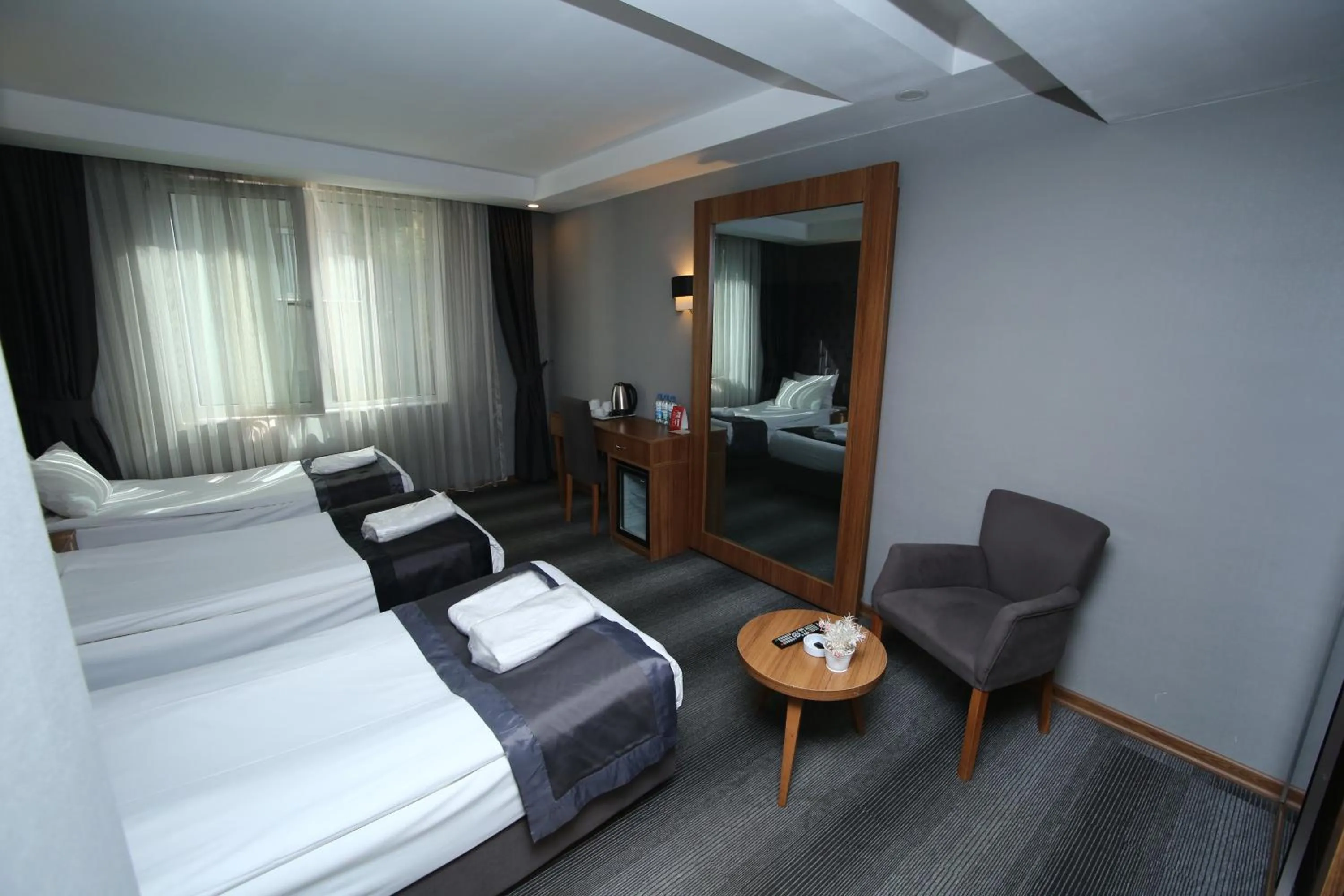 Bed in Grand Silay Hotel