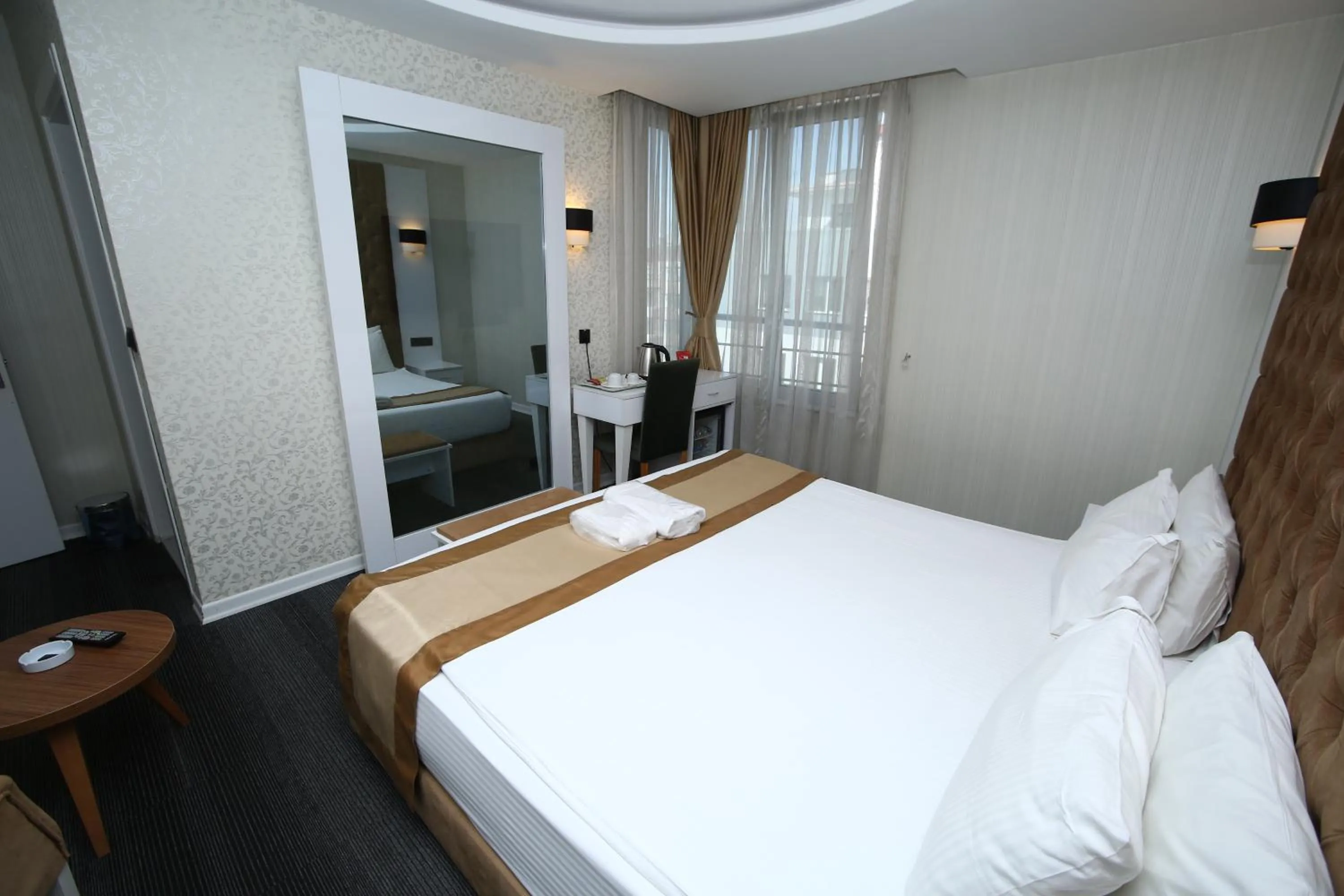 Bed in Grand Silay Hotel