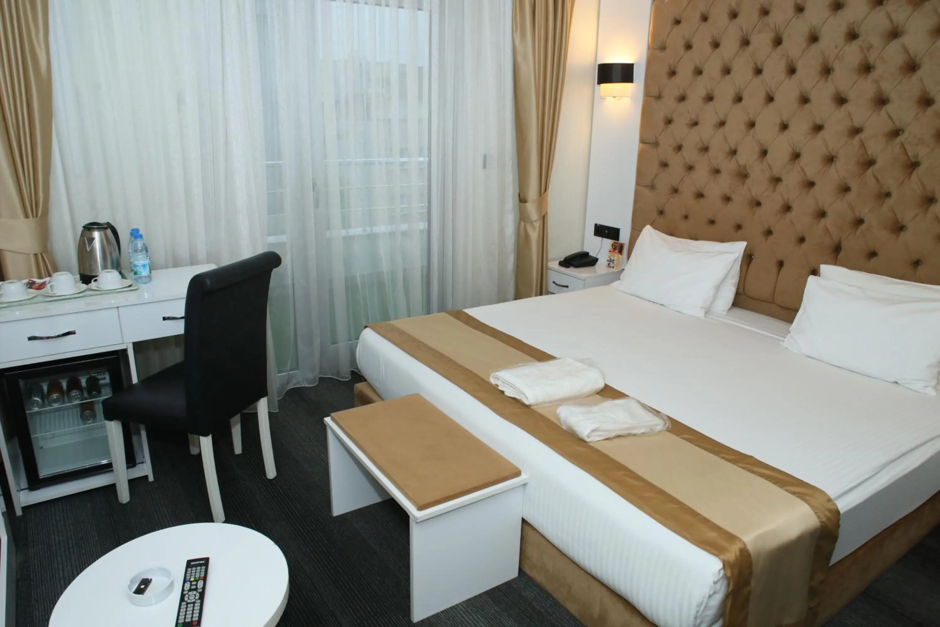 Bed in Grand Silay Hotel