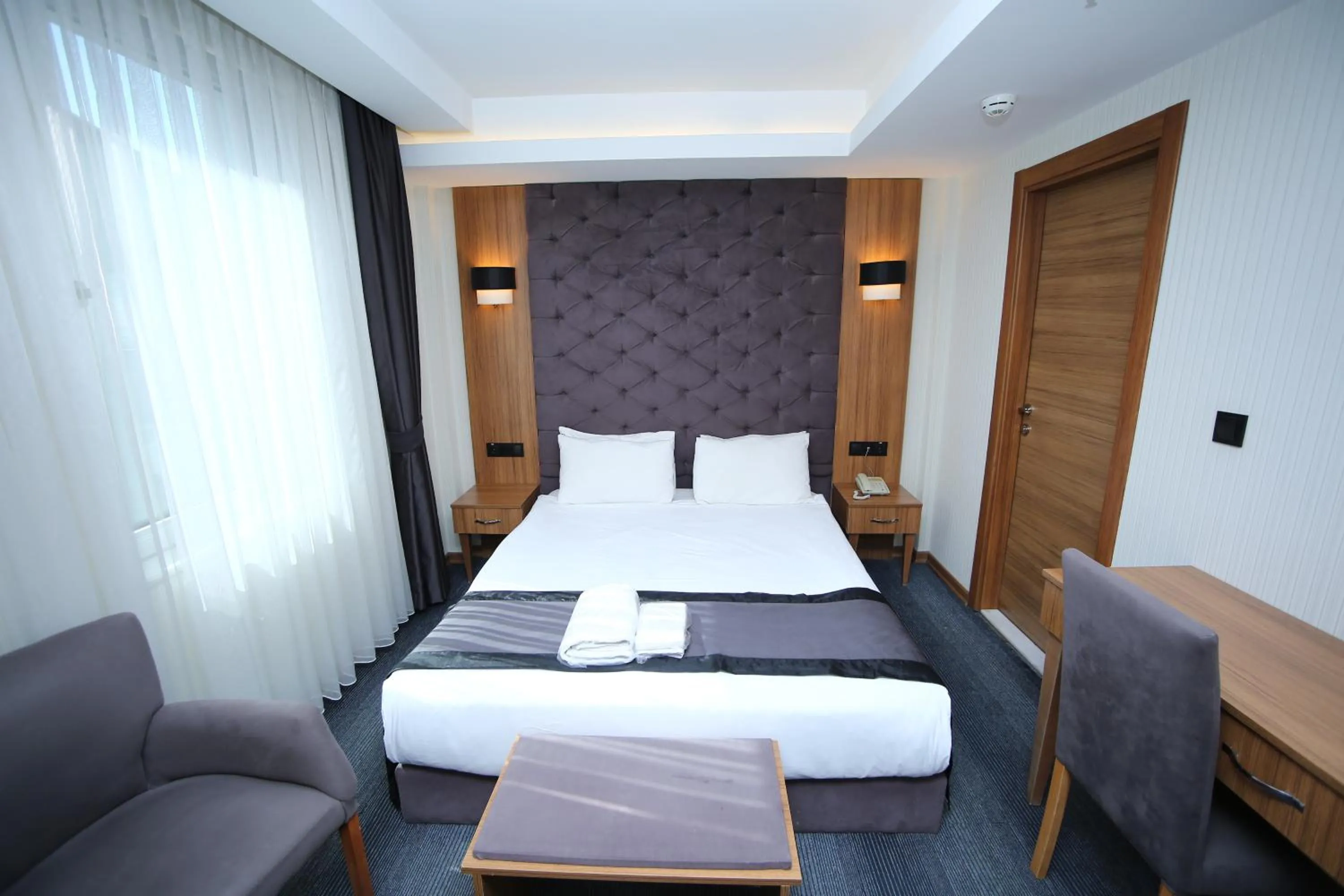 Bed in Grand Silay Hotel