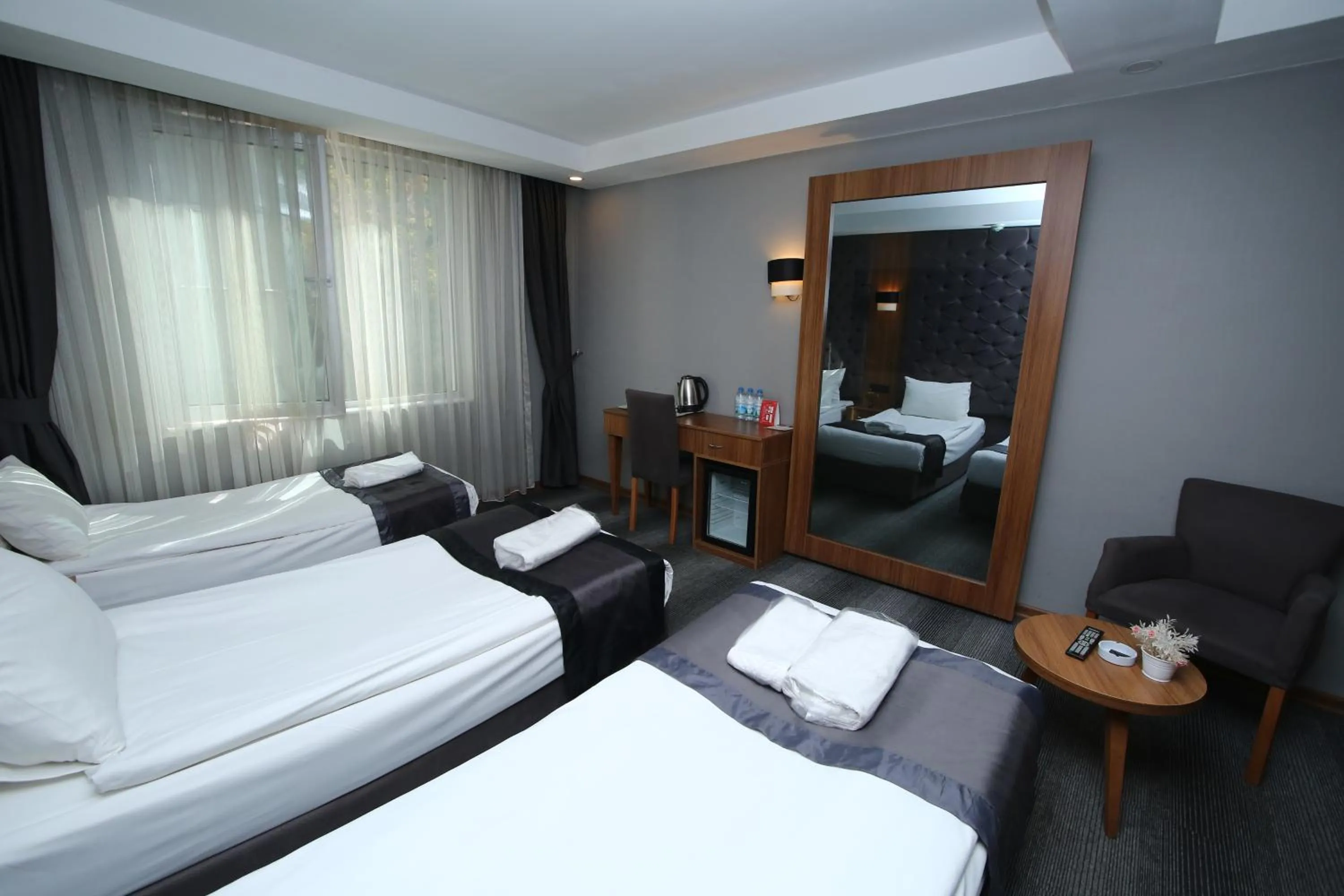 Bed in Grand Silay Hotel