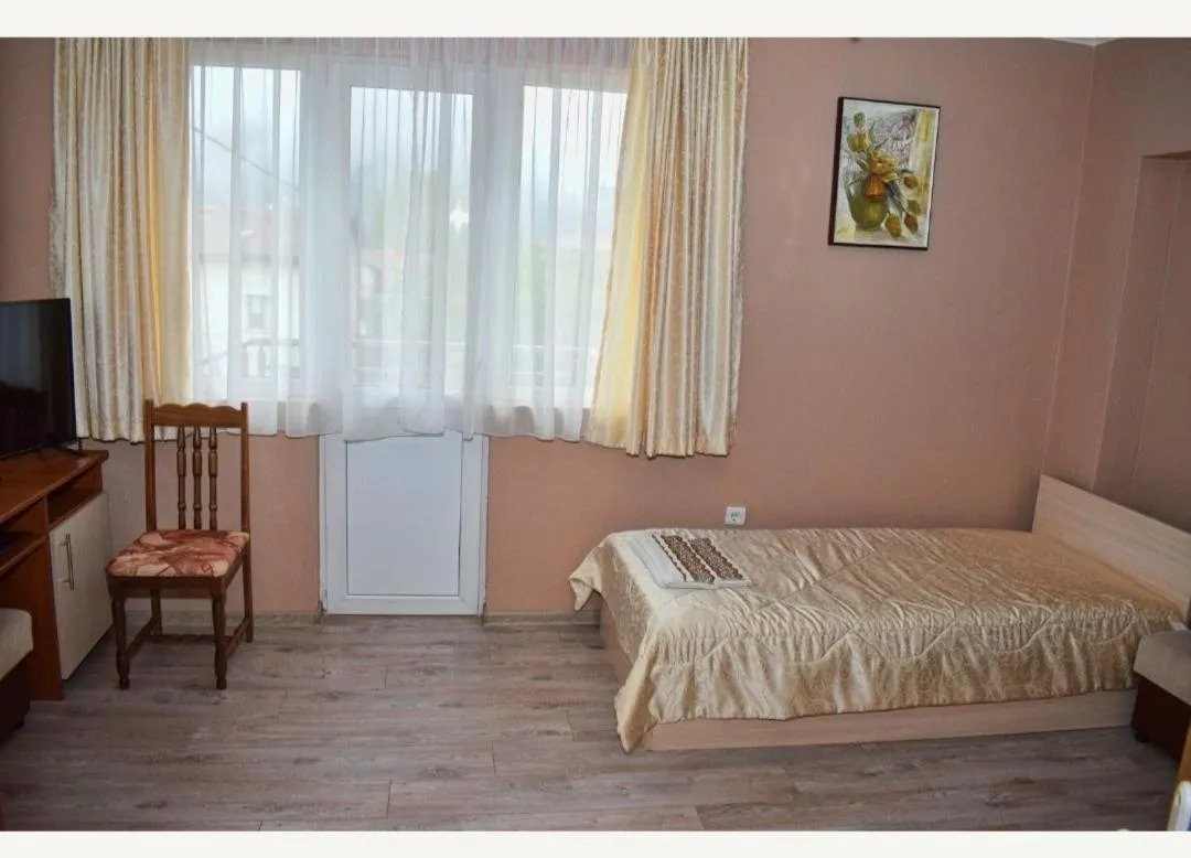 Toilet, Bed in Family Hotel Miglena