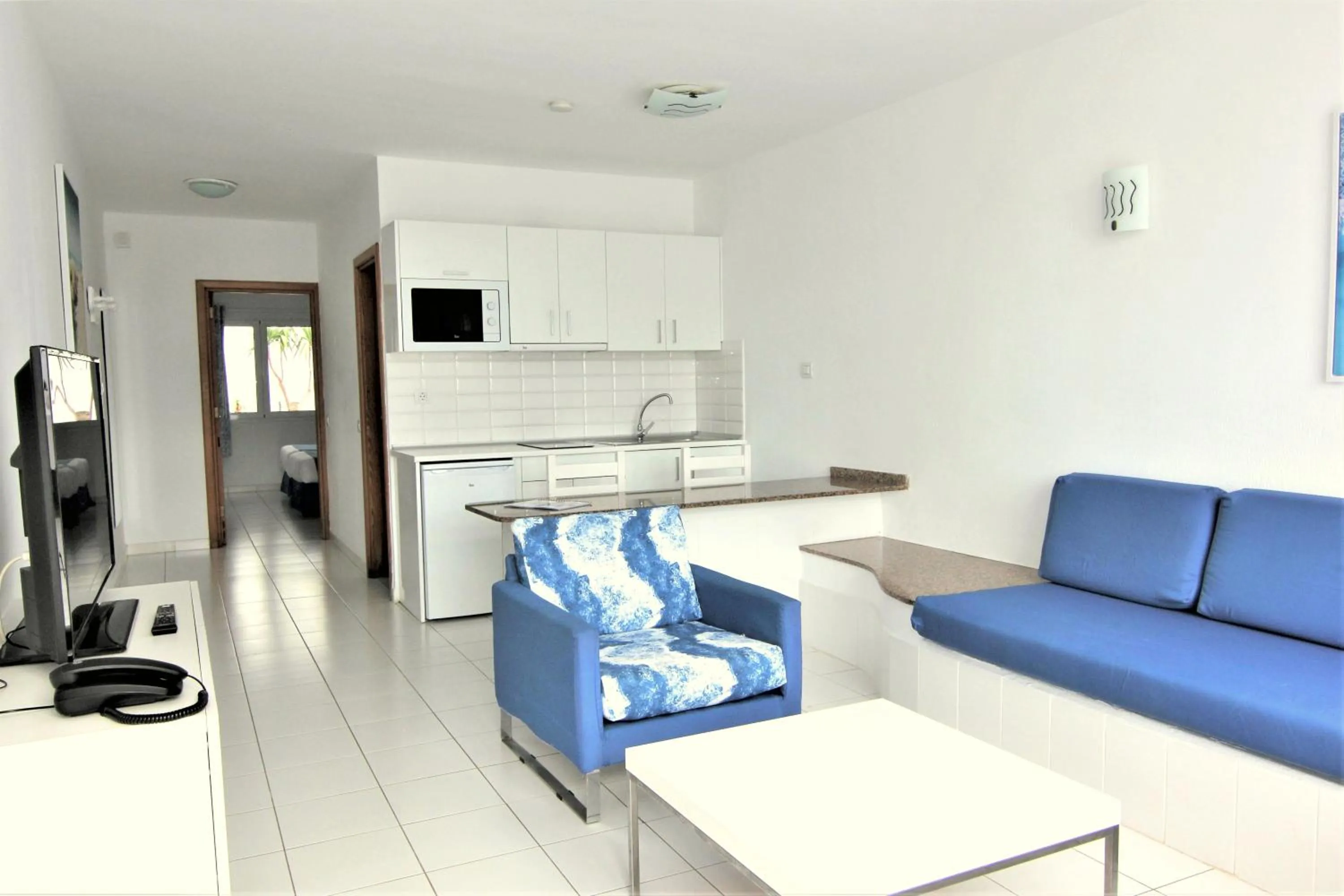 Kitchen or kitchenette in Apartamentos Orly Club Arena Dorada