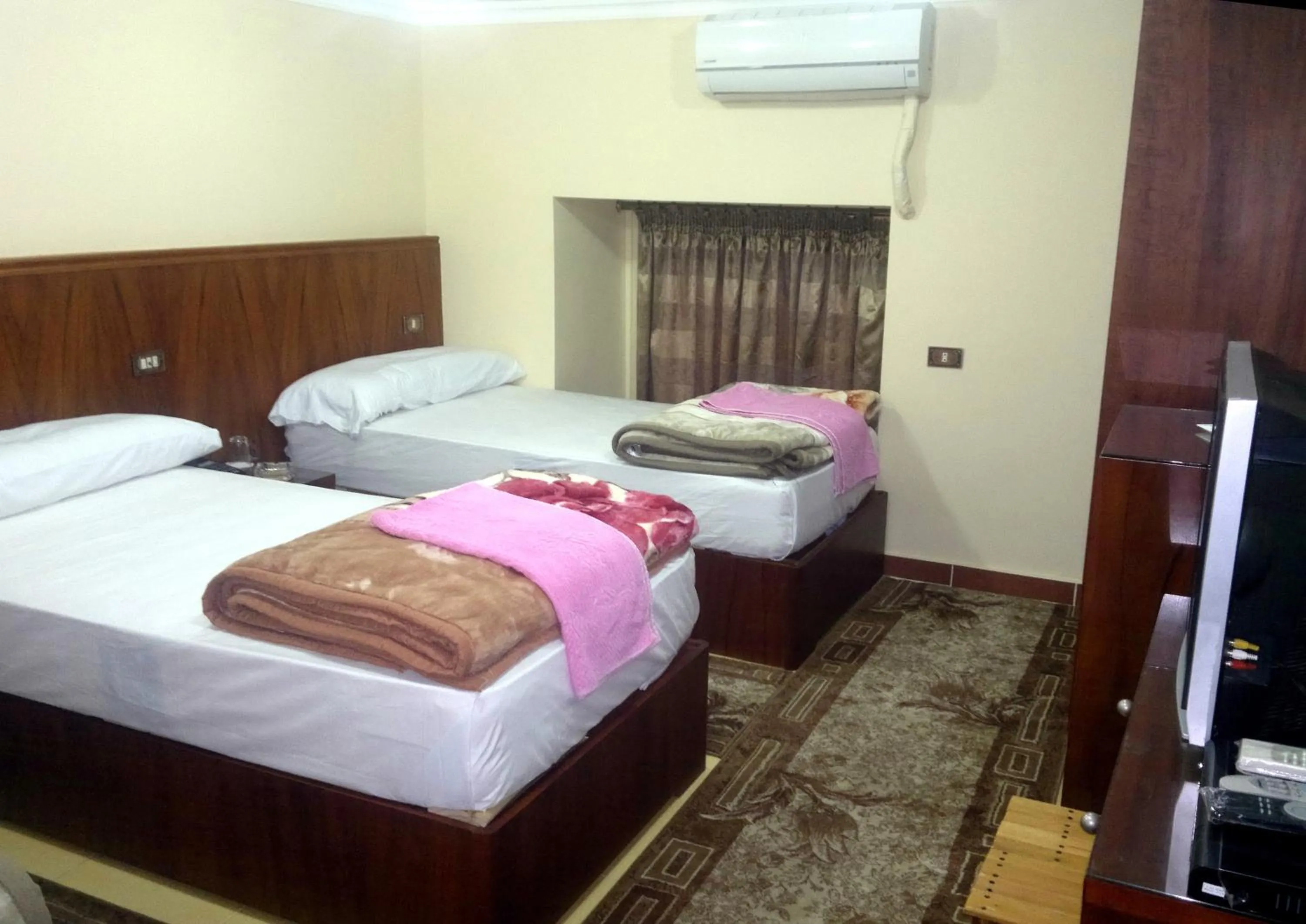 Bedroom in Al Maghraby Hotel