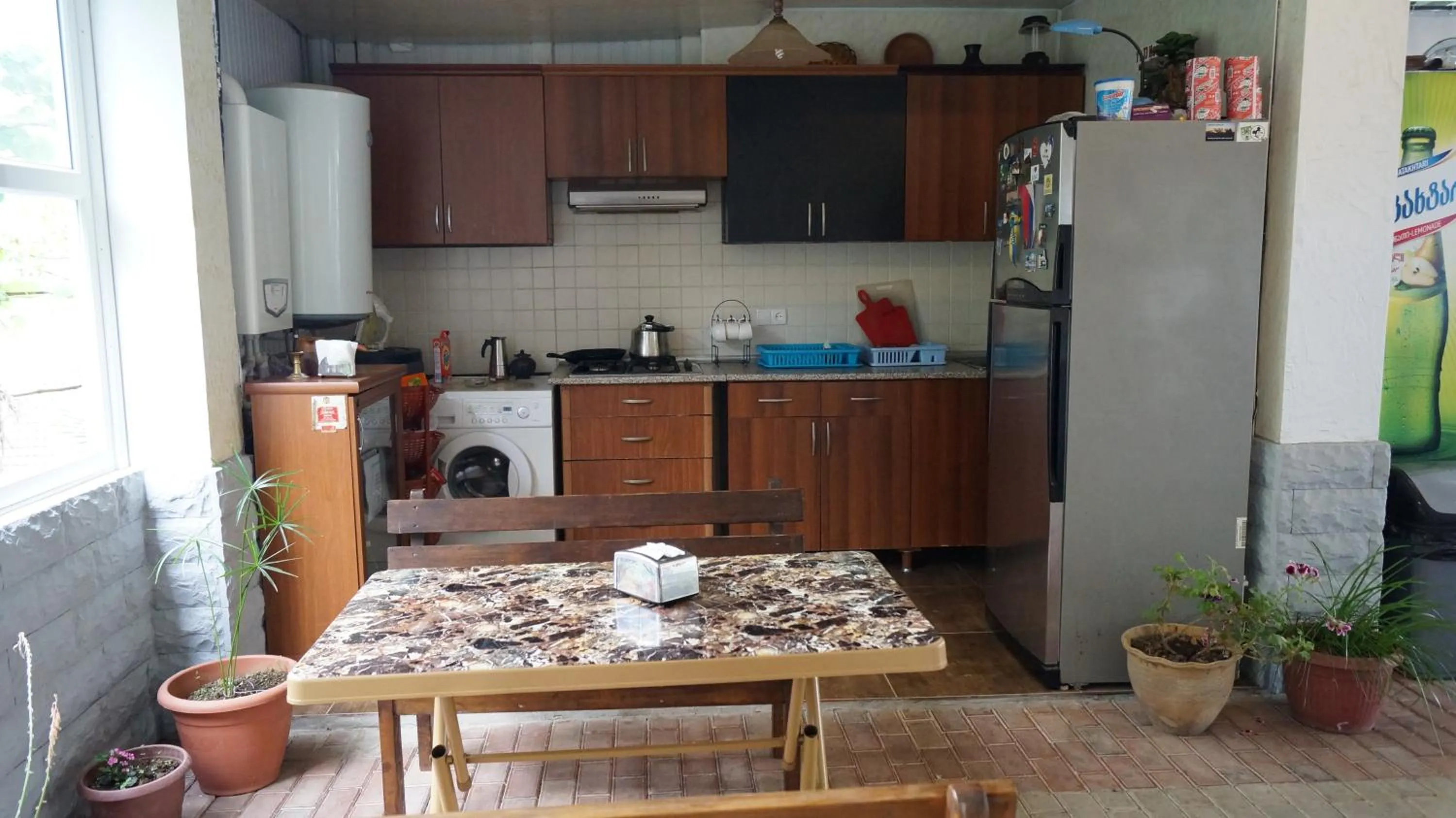 Kitchen or kitchenette in TJ Guest House