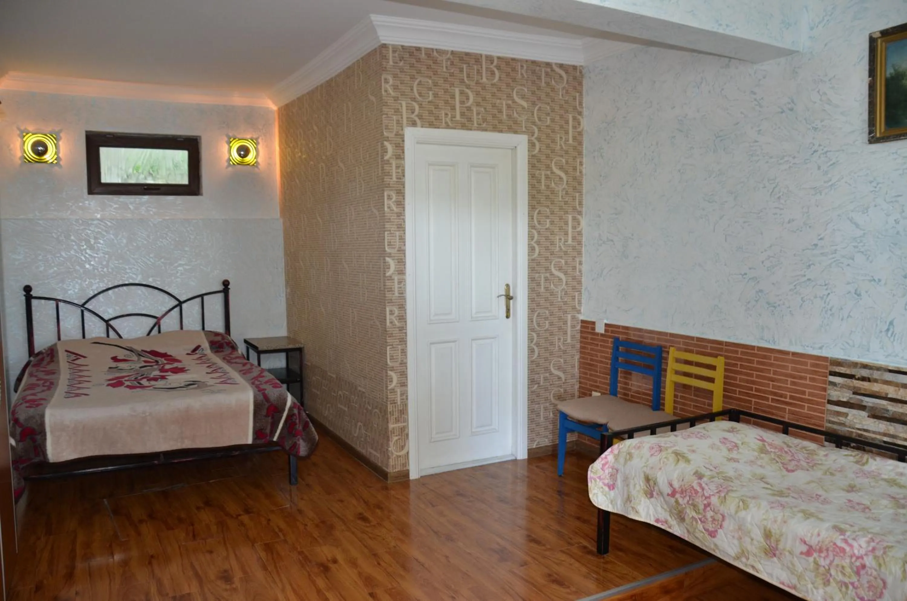 Photo of the whole room, Bed in TJ Guest House