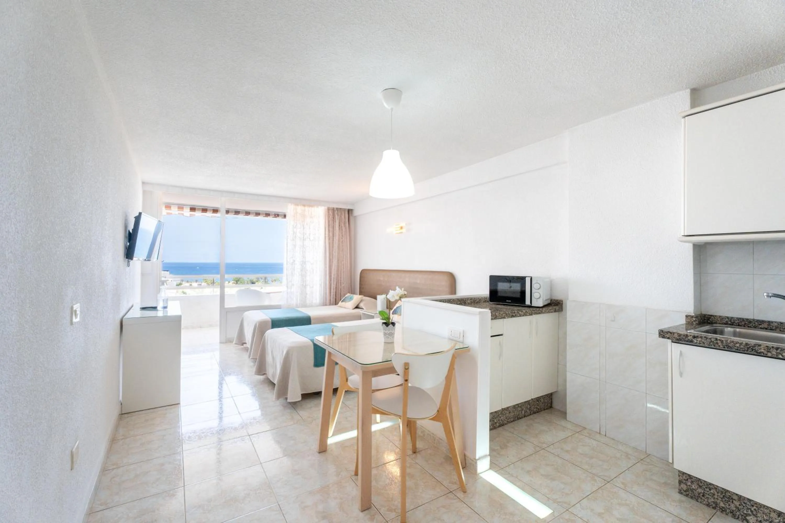 Kitchen or kitchenette in Apartamentos Borinquen