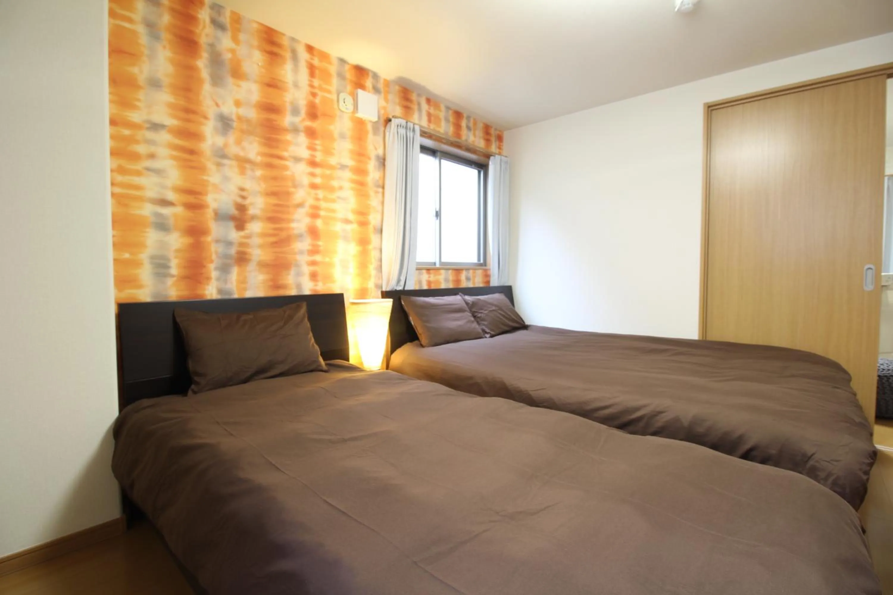 Bed in LiB PLUS VILLA Mibu