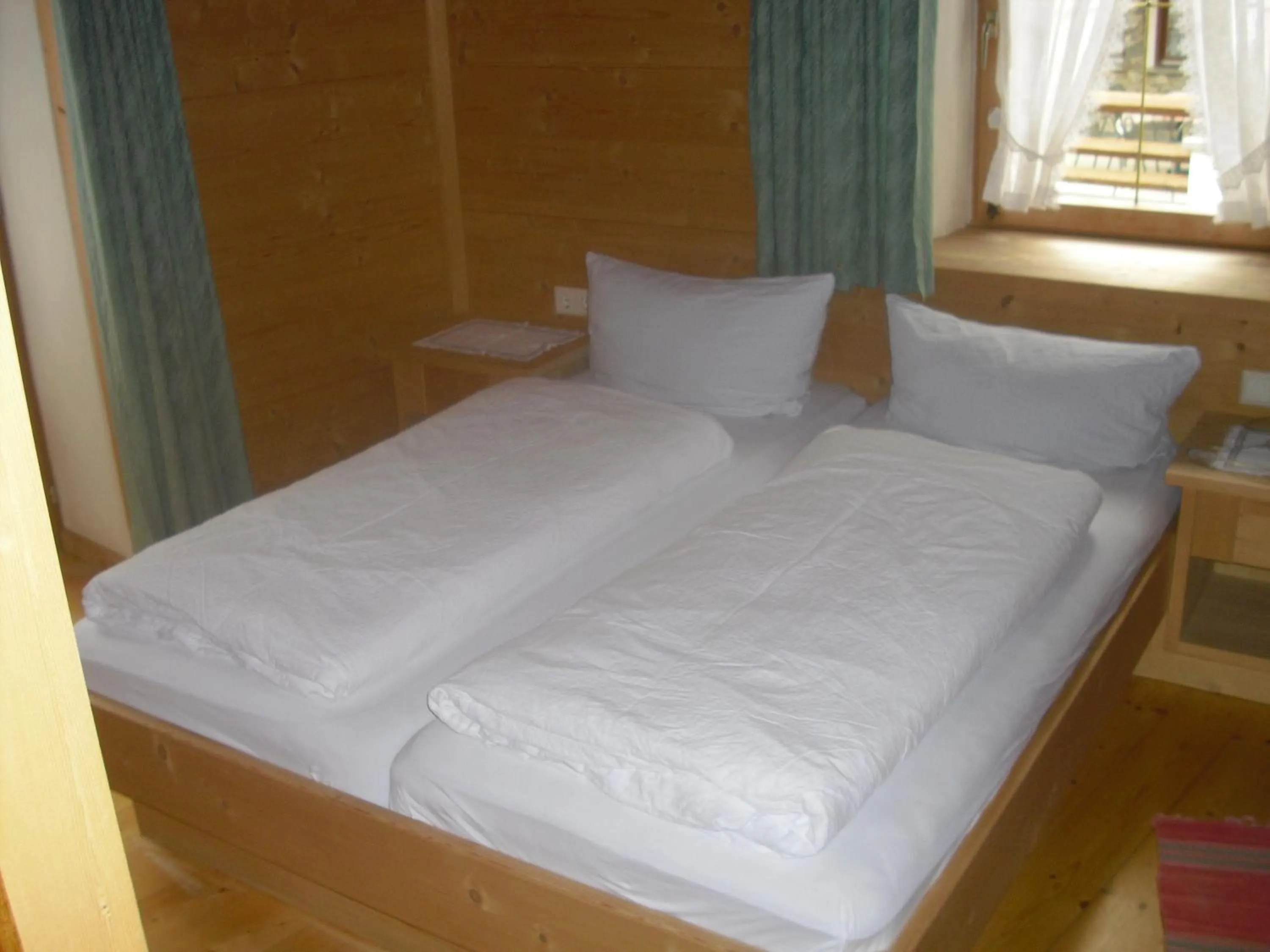 Bed in Hotel Edelweiss