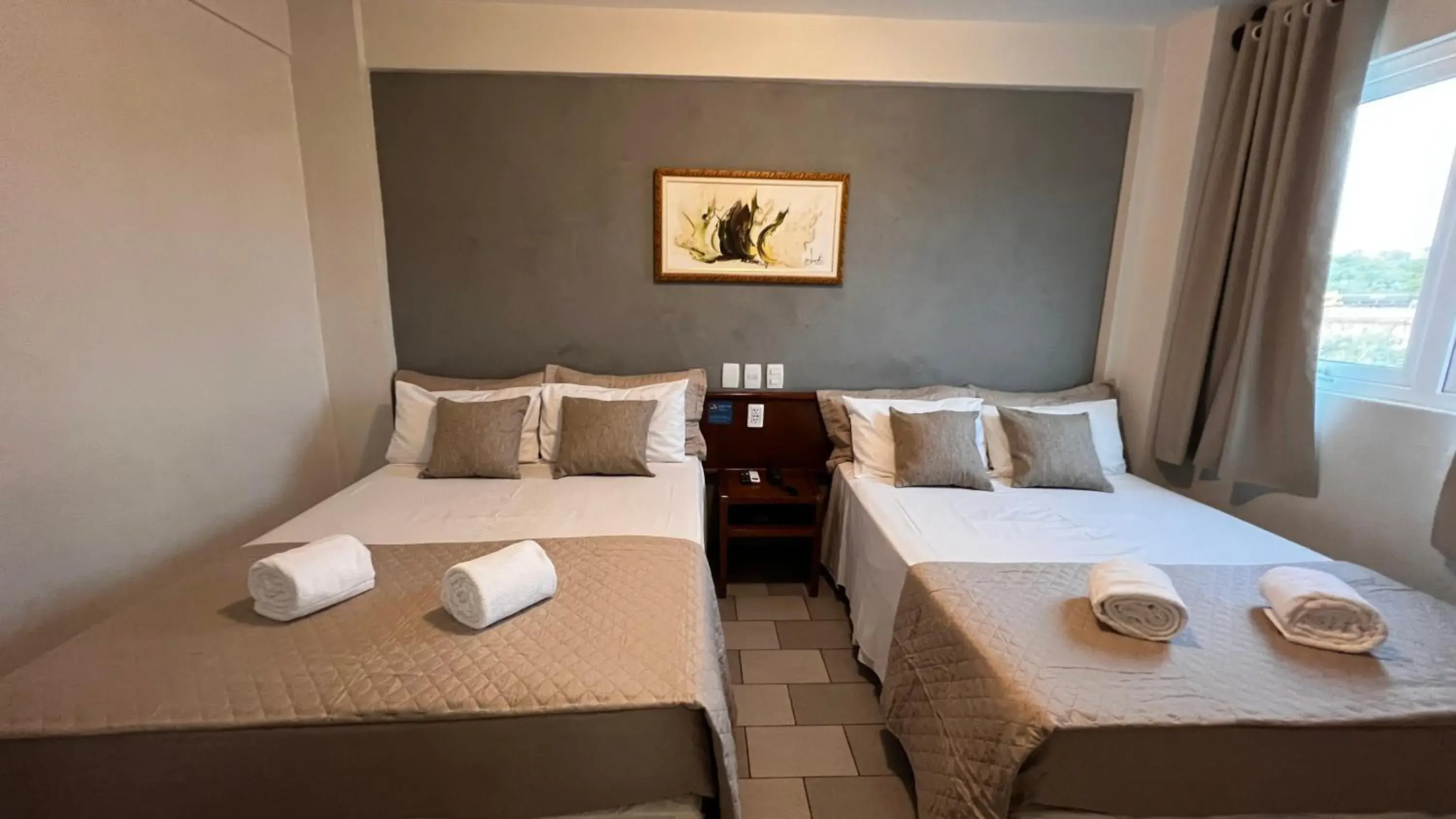 Comfort Quadruple Room - single occupancy in Hotel Portinari Ponte da Amizade Comfort Quadruple Room - single occupancy in Hotel Portinari Ponte da Amizade