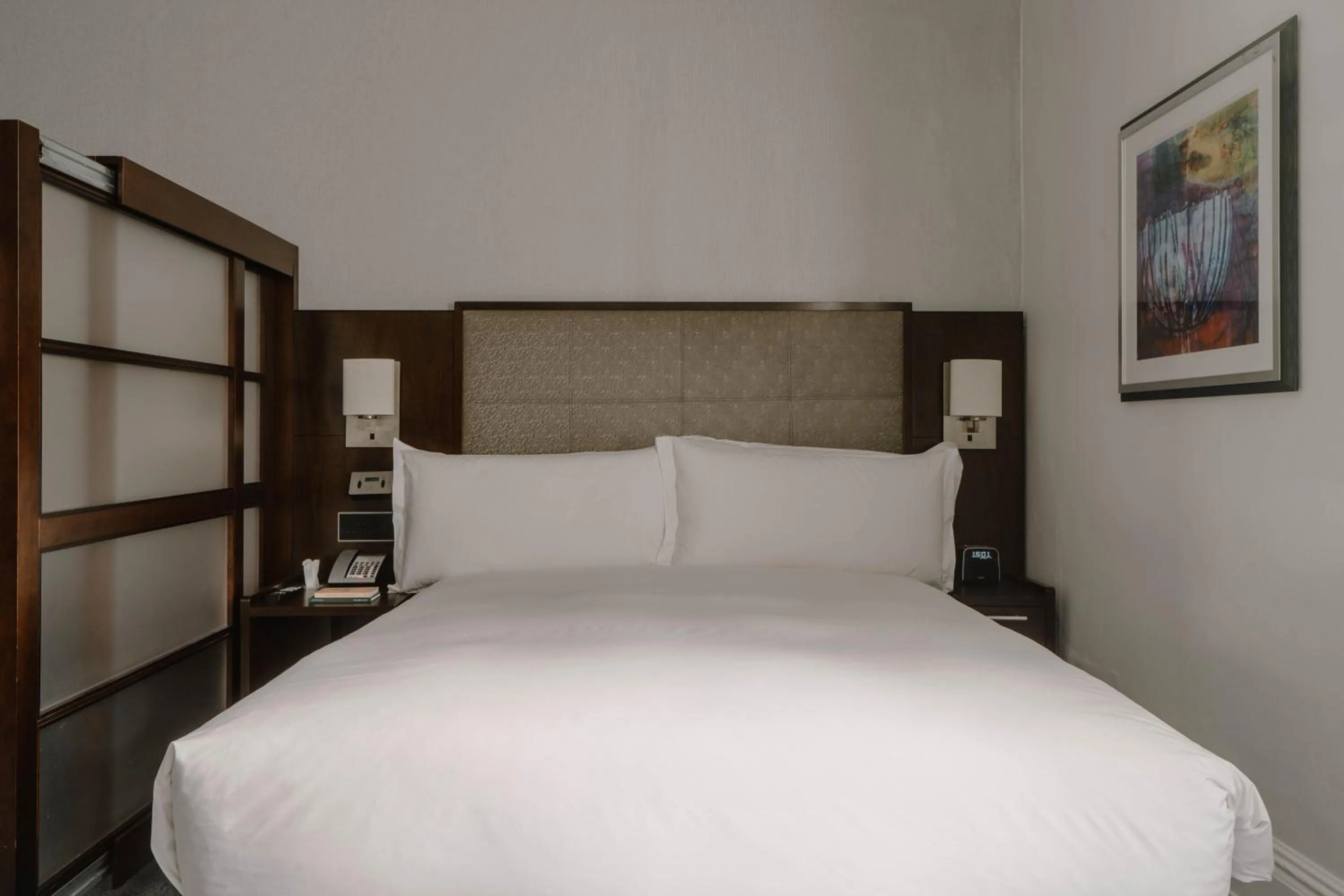 Bed in Club Quarters Hotel Trafalgar Square, London