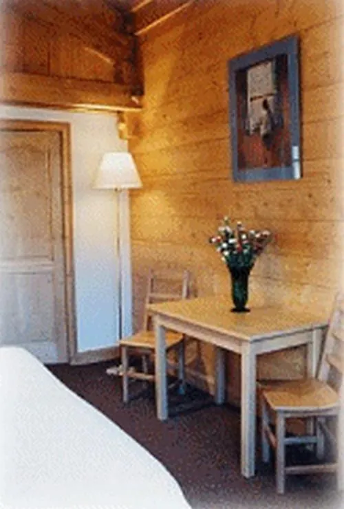 Seating area, Bed in Oustalet