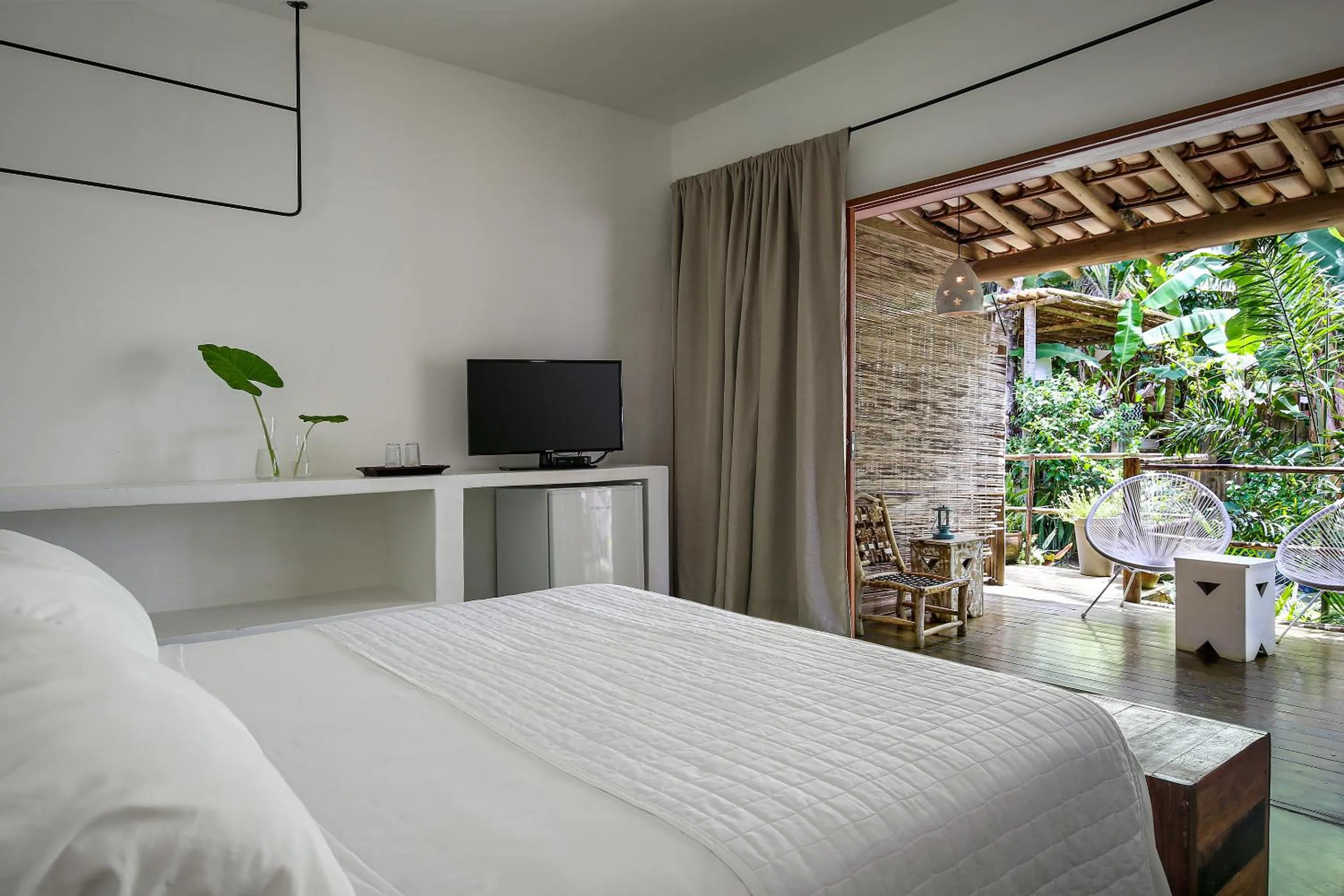 Bed in Pousada Seis e Meia