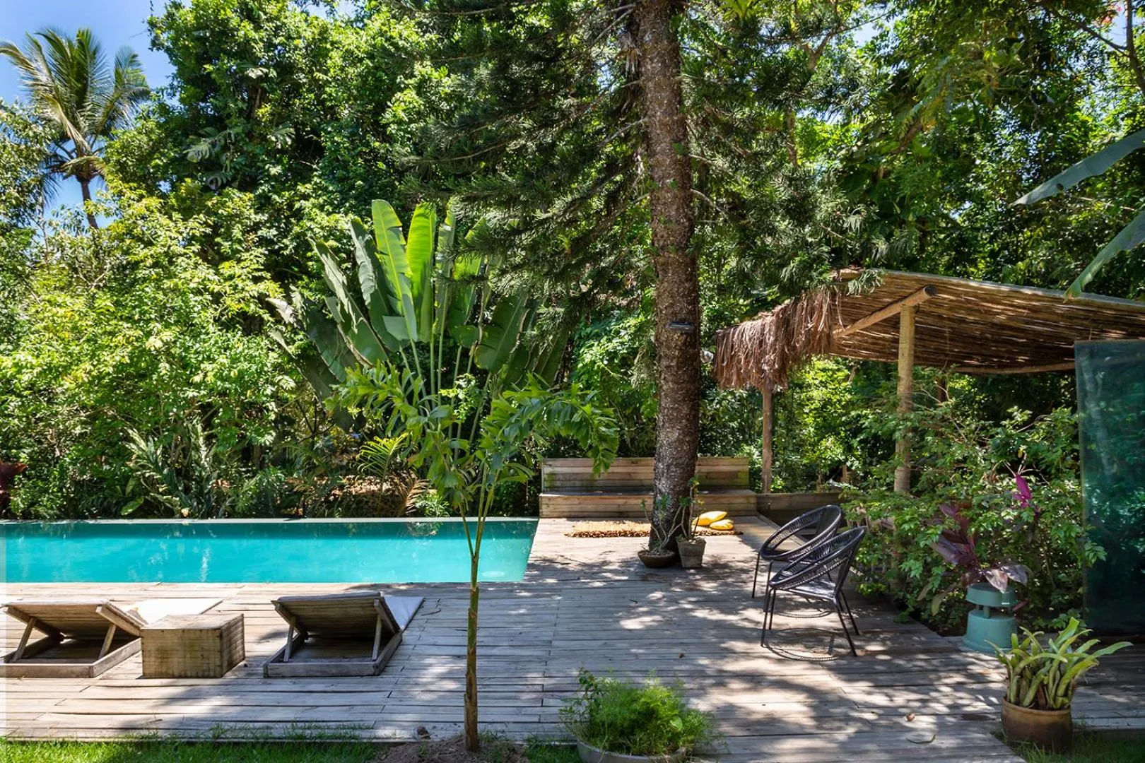 Swimming pool in Pousada Seis e Meia