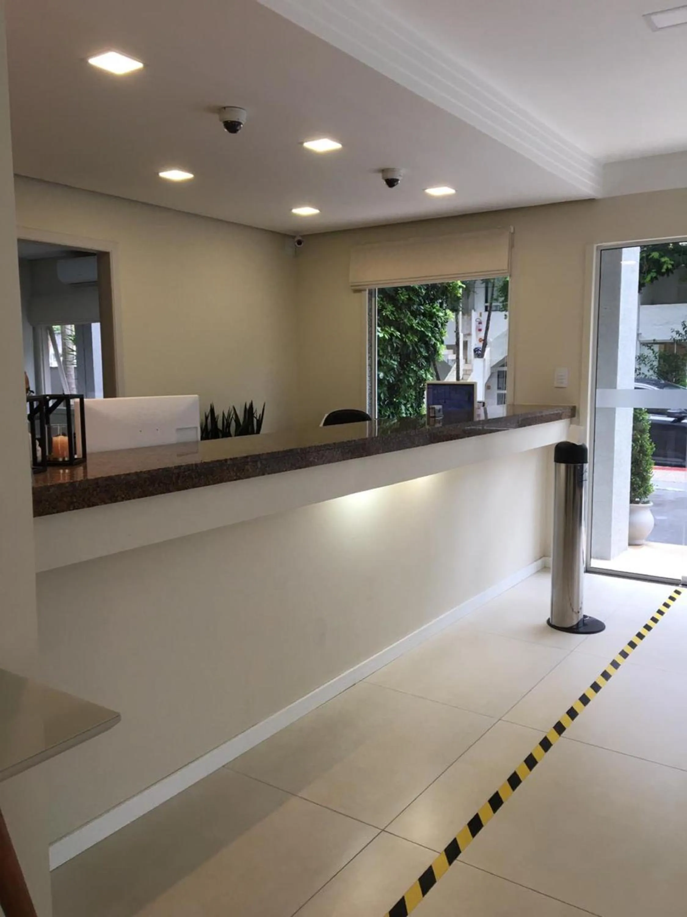 Lobby or reception in Caravaggio Praia Hotel