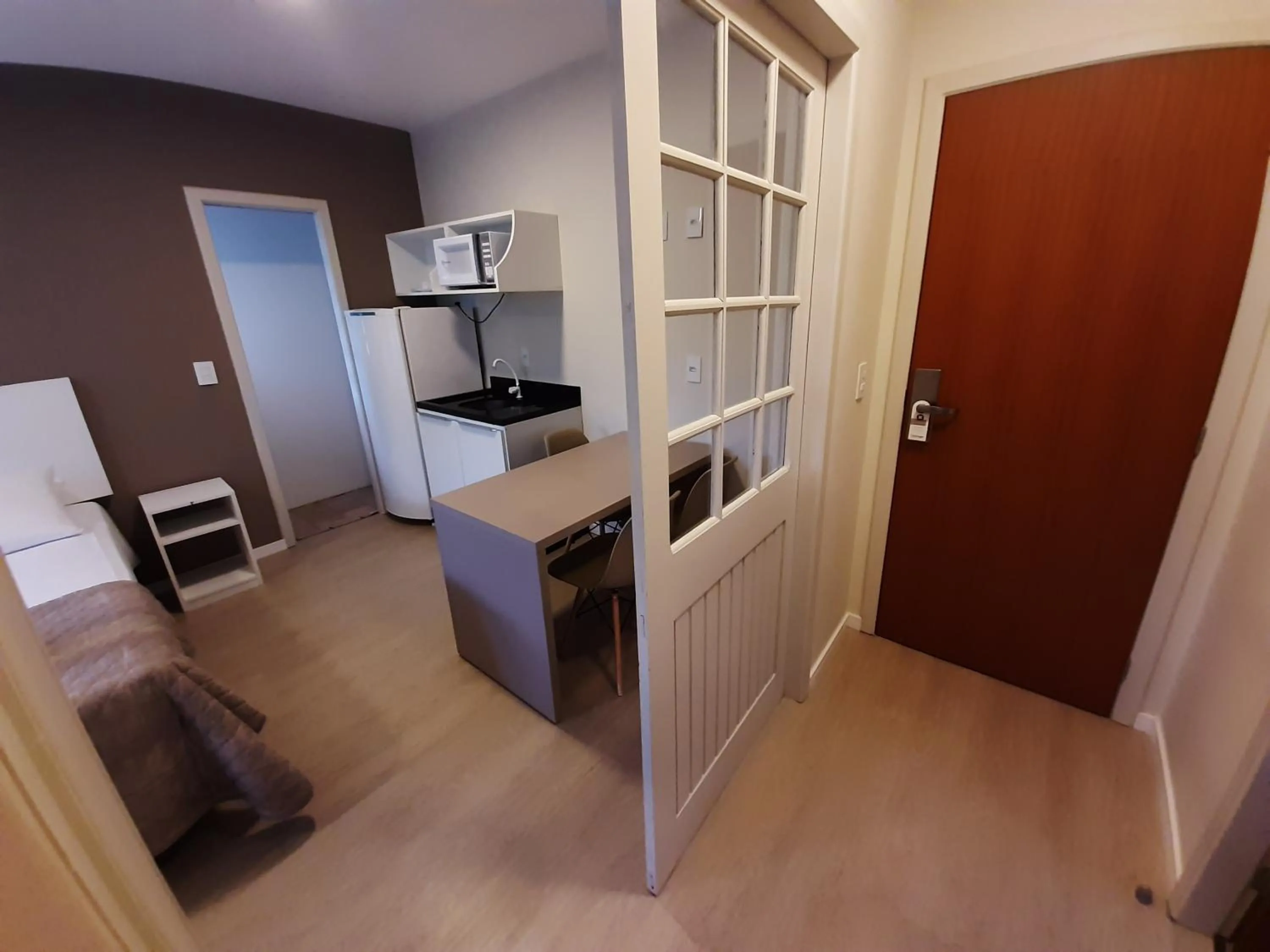 Kitchen or kitchenette in Caravaggio Praia Hotel