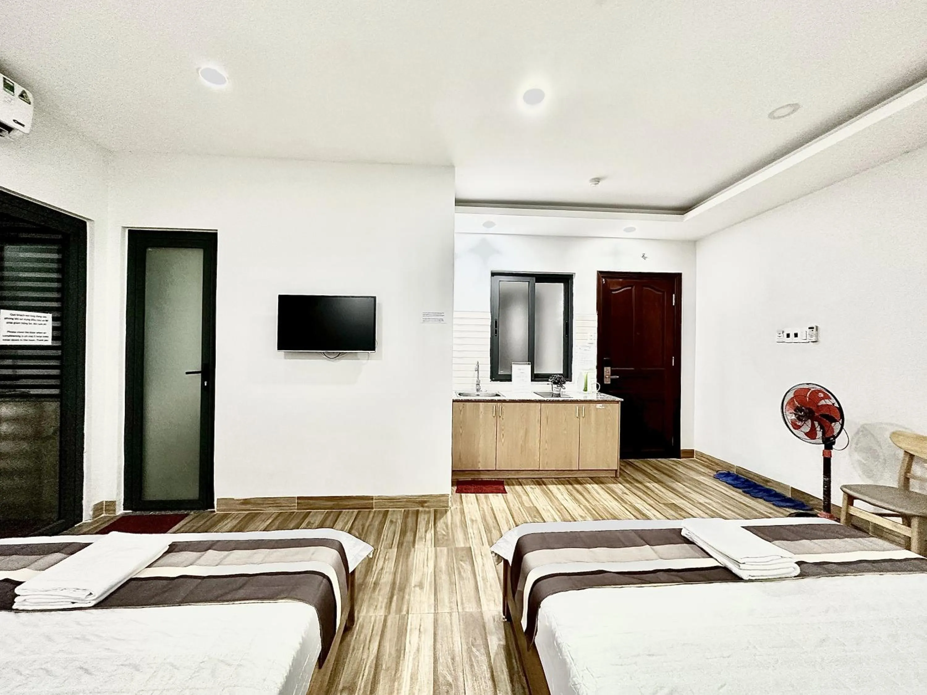 Bed in The Jade Hotel near Tan Son Nhat Airport