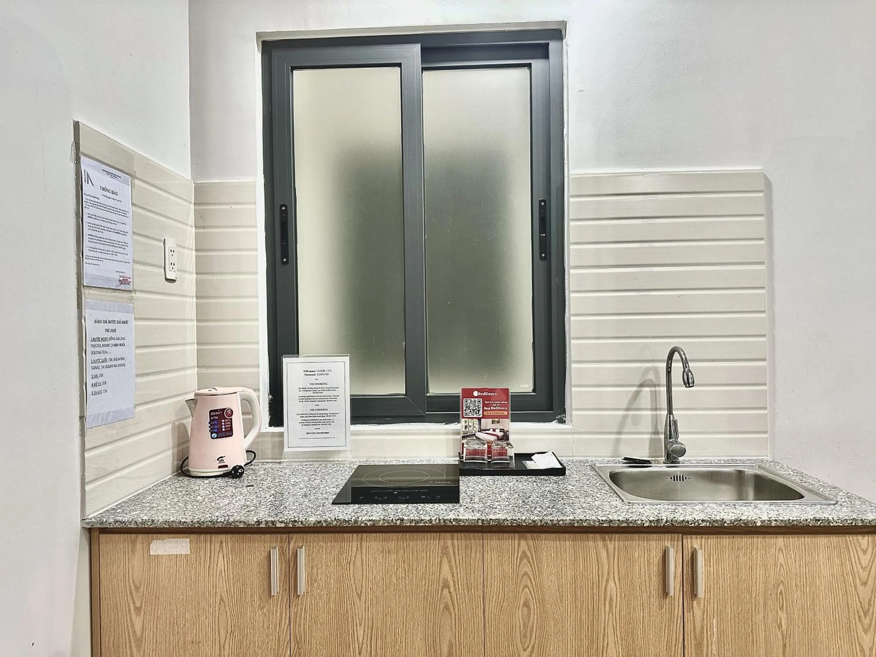 Kitchen or kitchenette in The Jade Hotel near Tan Son Nhat Airport