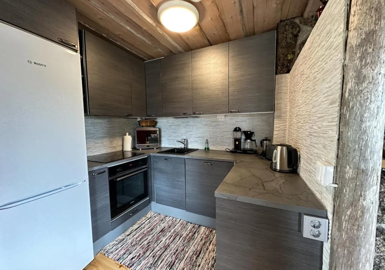 Kitchen or kitchenette in Napapiirin Järvilomat