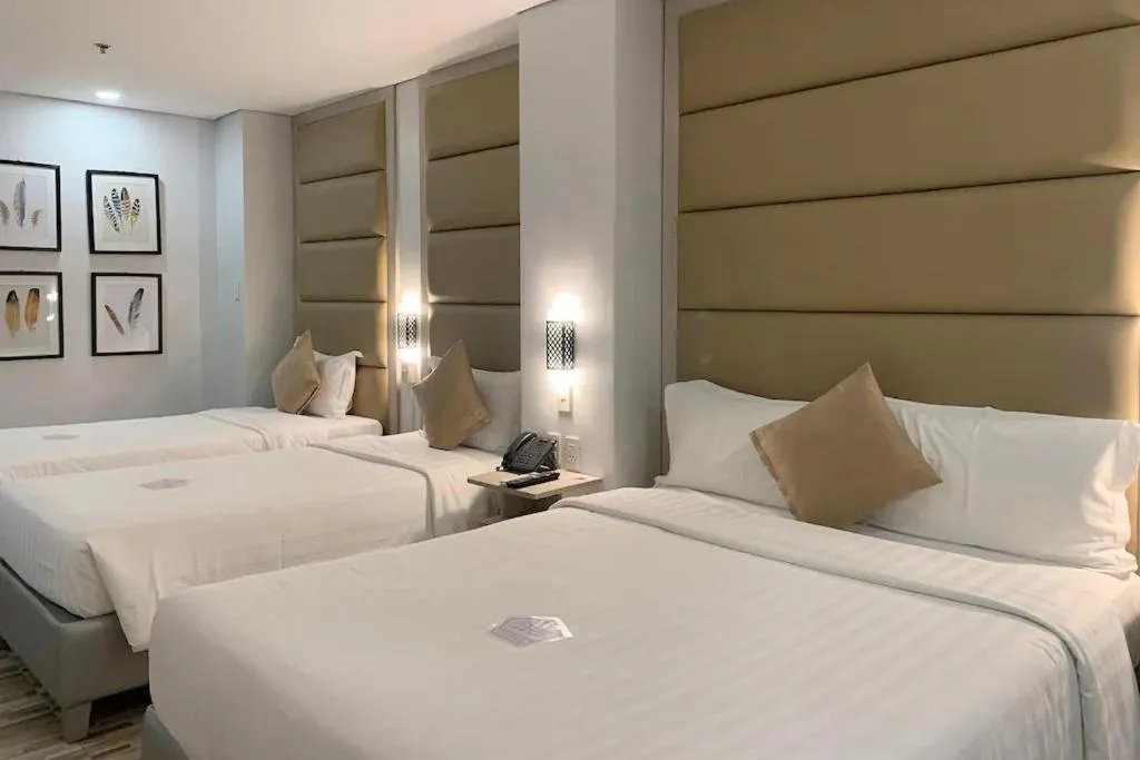 Bed in Amethyst Boutique Hotel Cebu powered by Cocotel