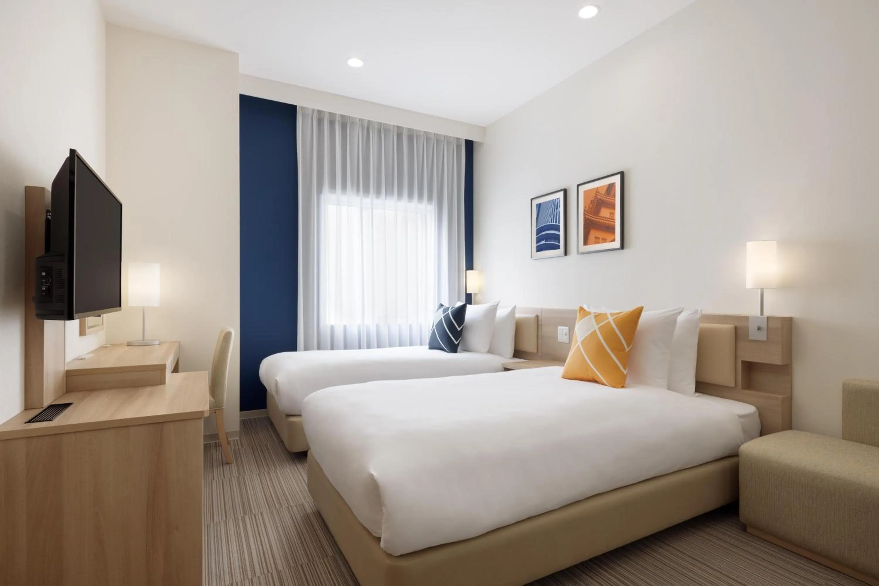 Bed in UNIZO INN Osaka Kitahama