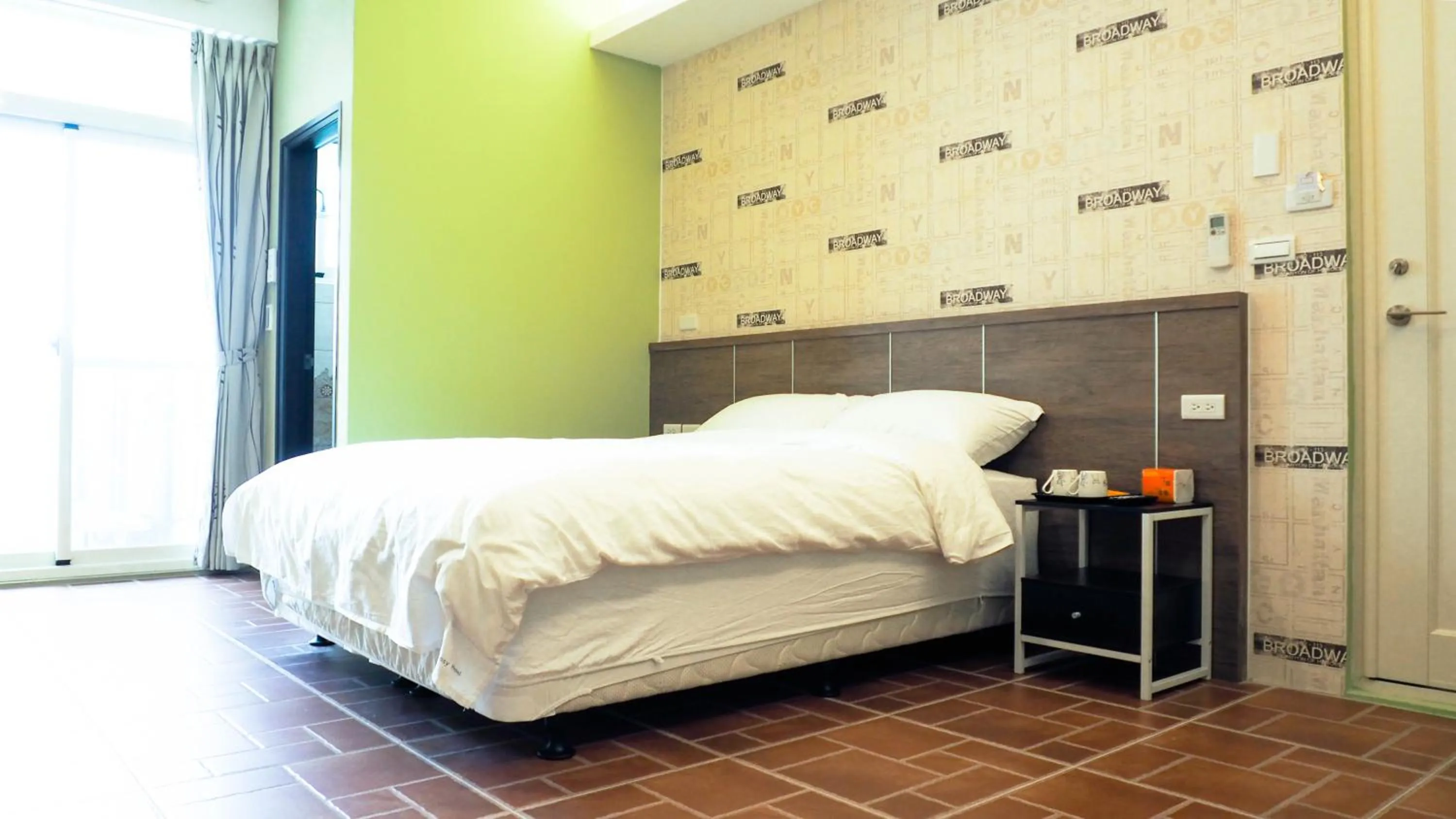 Bed in 金門微醺民宿 Kinmen TipsyHotel B&B