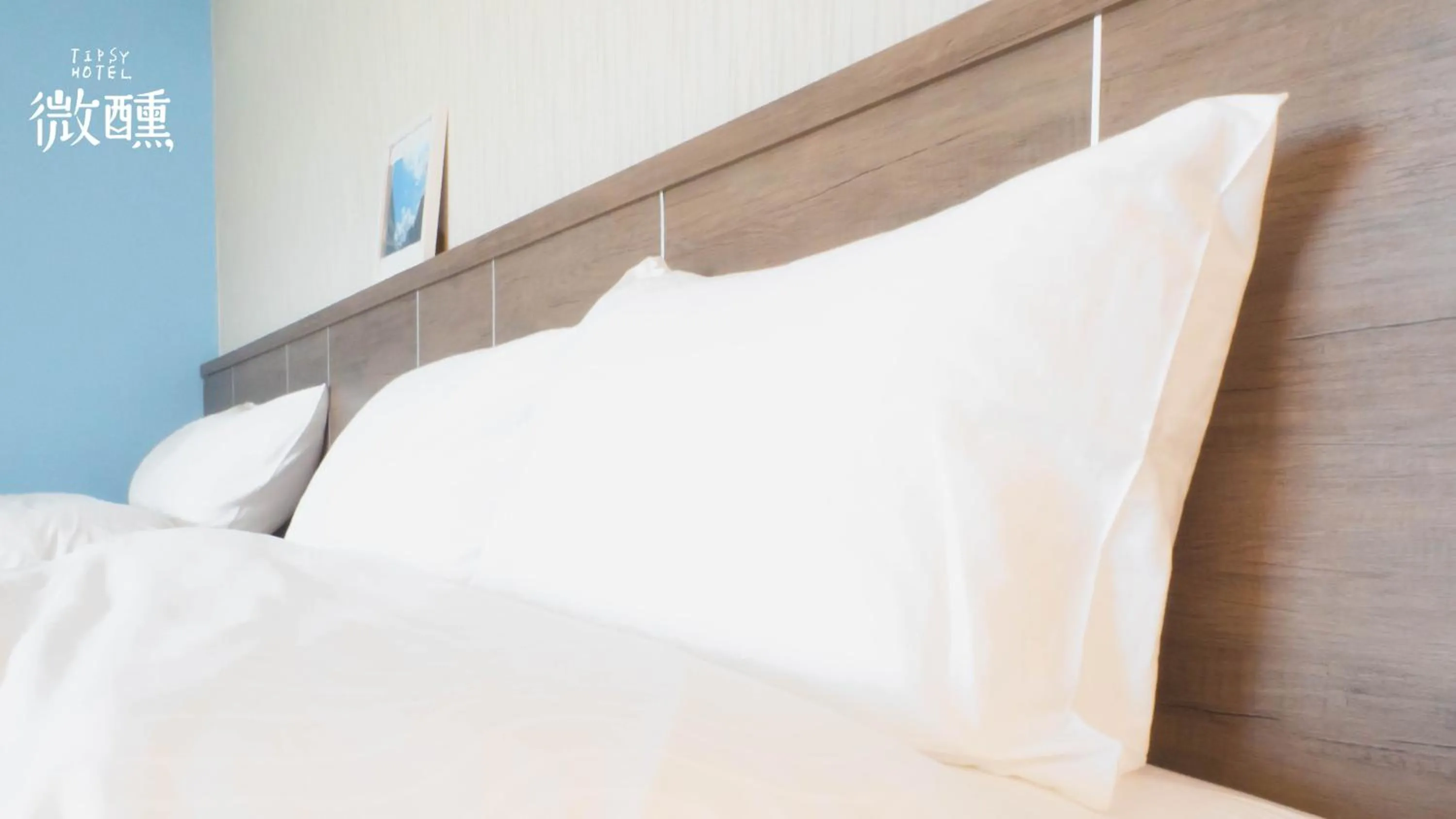 Bed in 金門微醺民宿 Kinmen TipsyHotel B&B