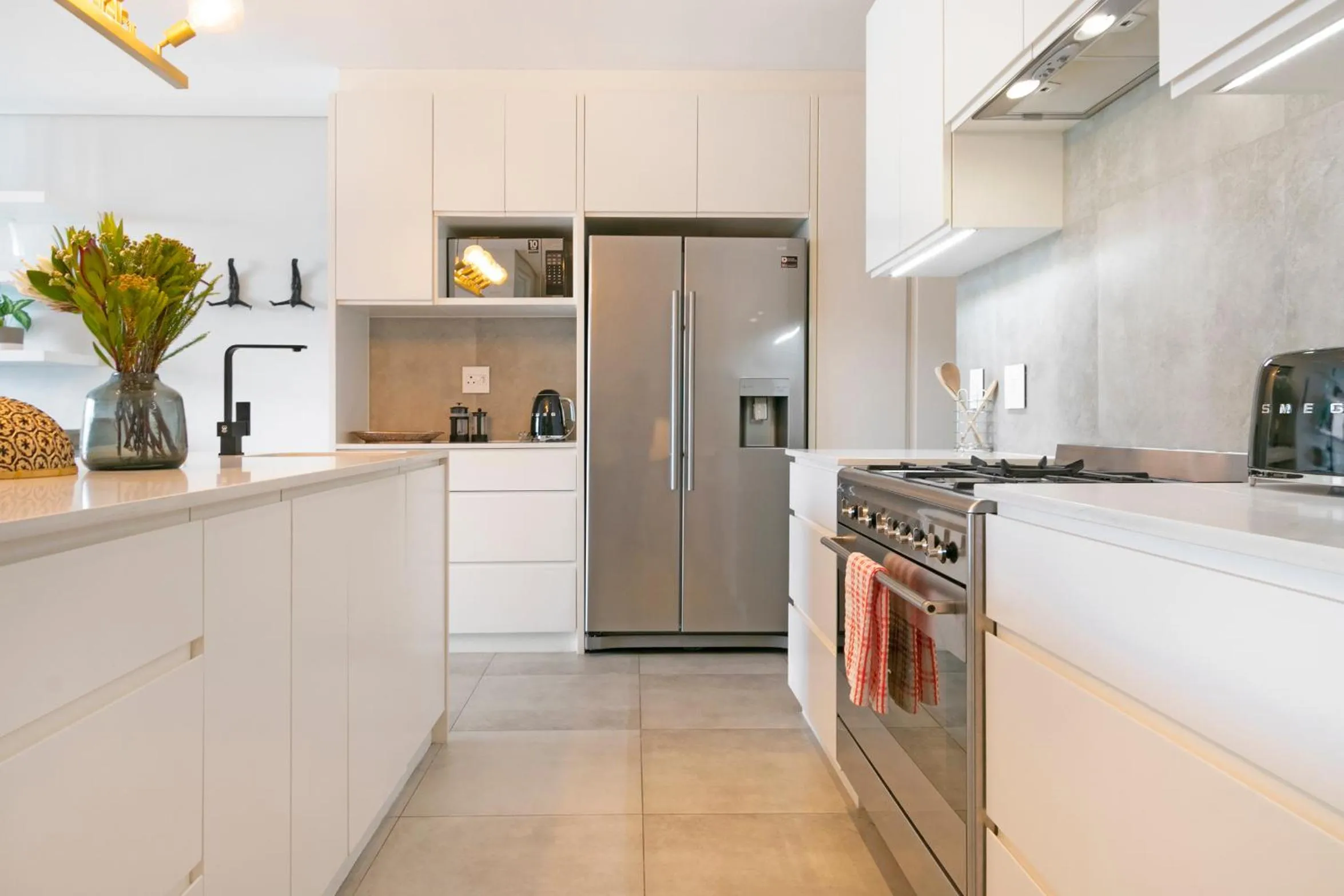 Bathroom in Elements Luxury Suites by Totalstay