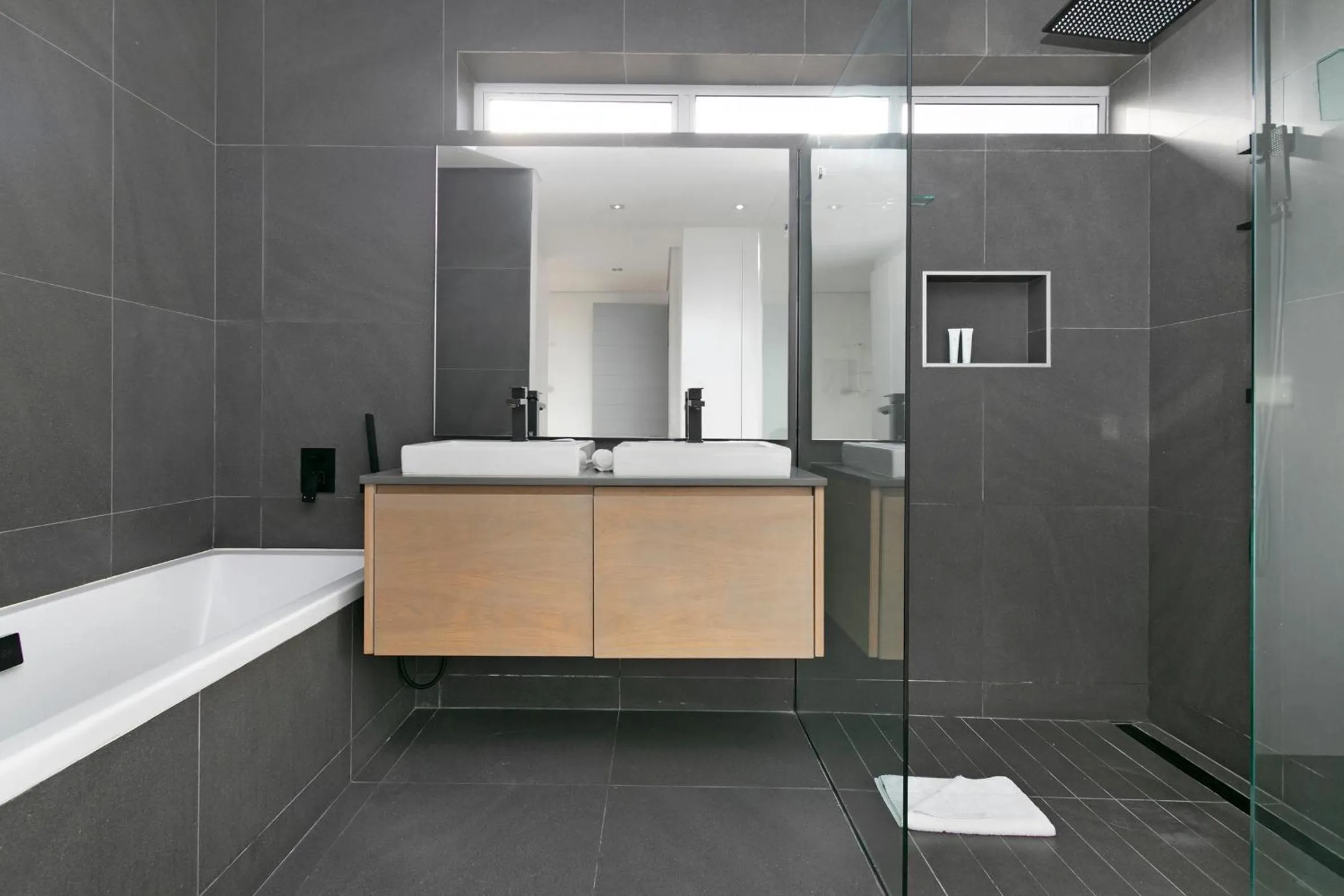 Bathroom in Elements Luxury Suites by Totalstay