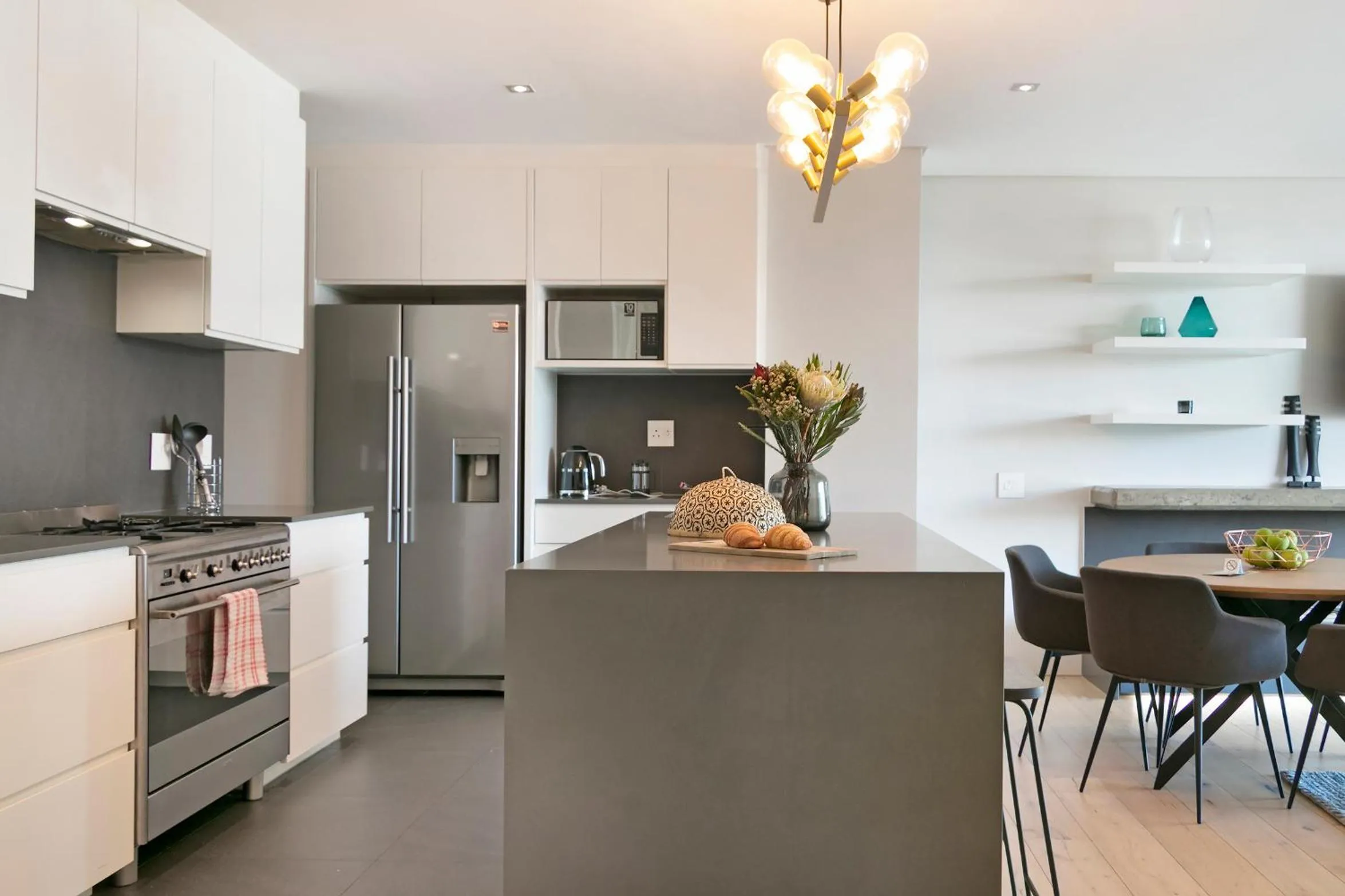 kitchen in Elements Luxury Suites by Totalstay