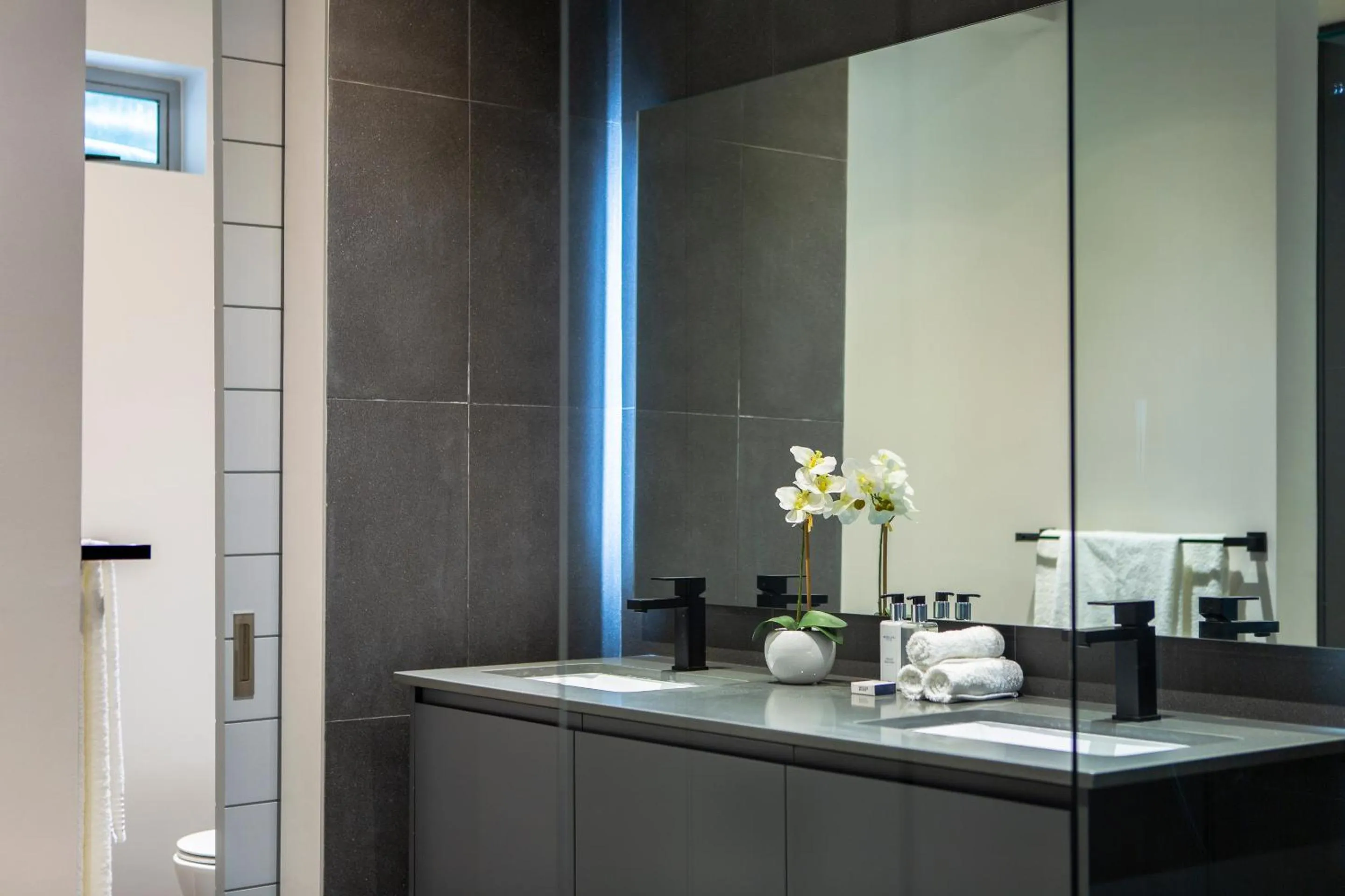 Shower in Elements Luxury Suites by Totalstay