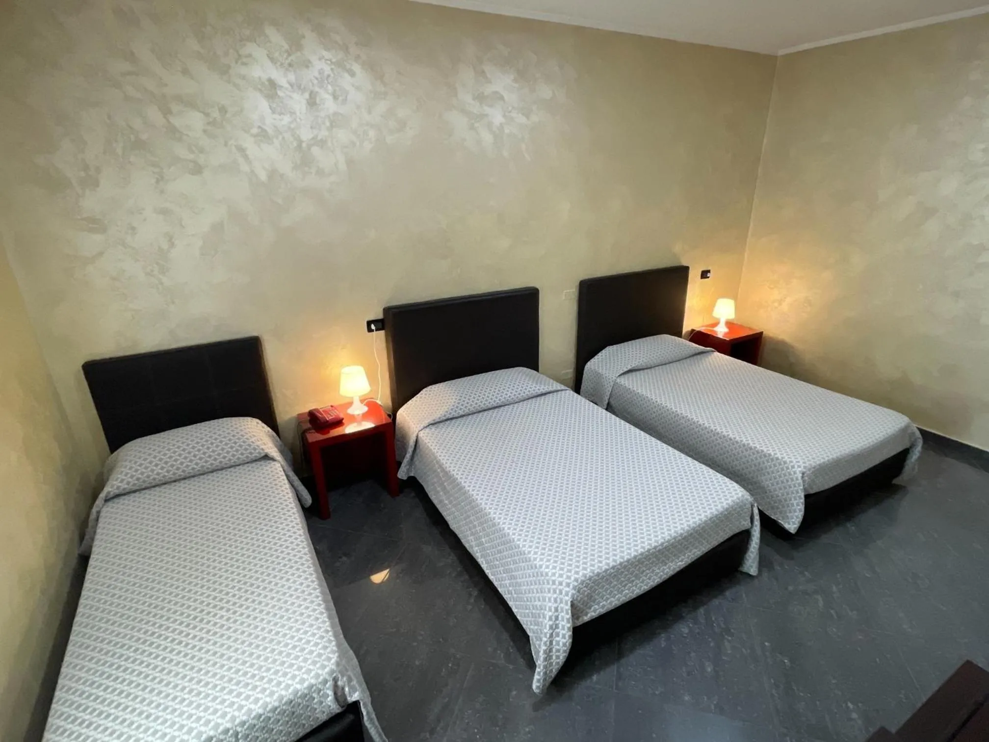 Bed in Hotel Toscano