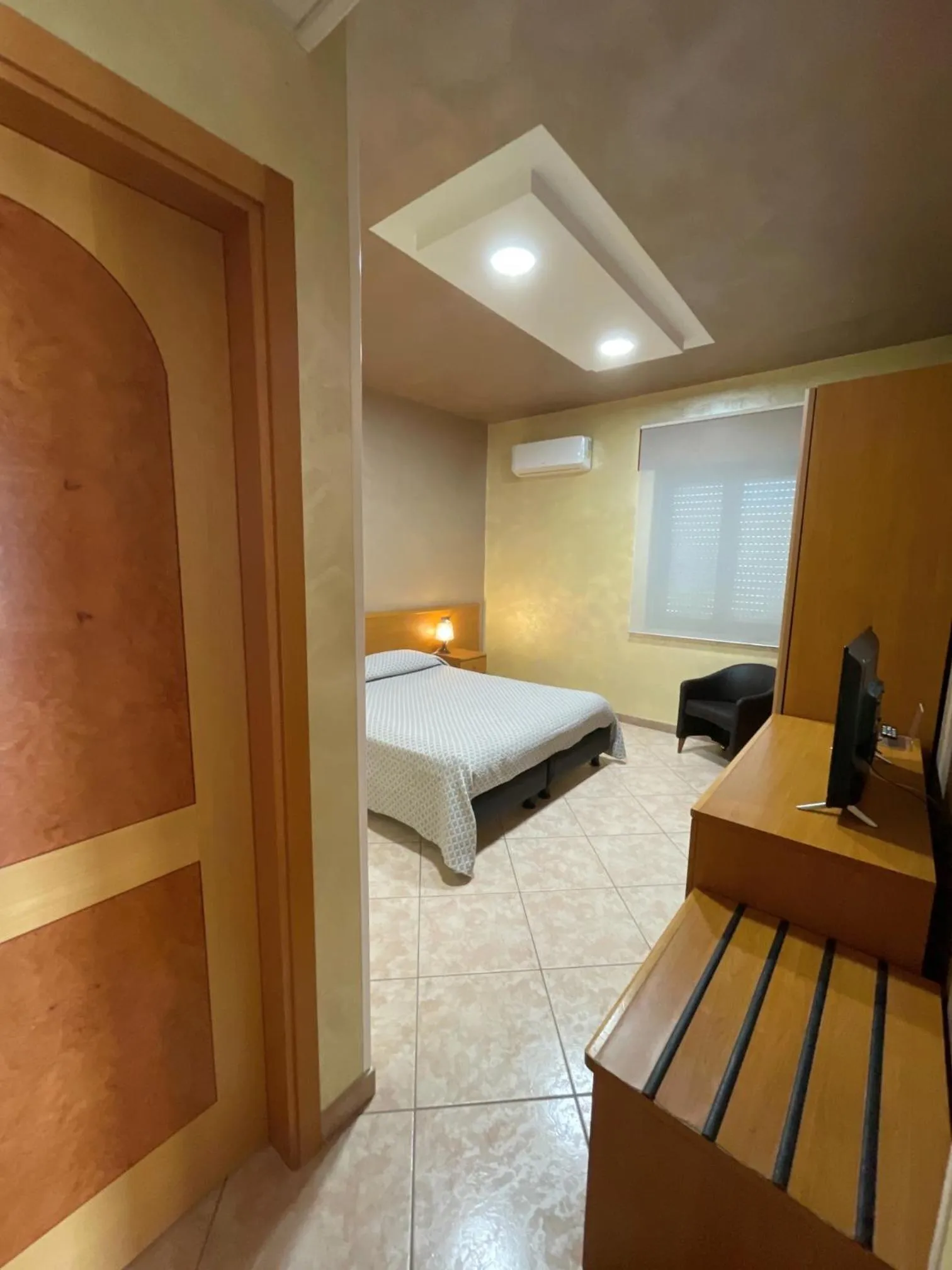 Bed in Hotel Toscano