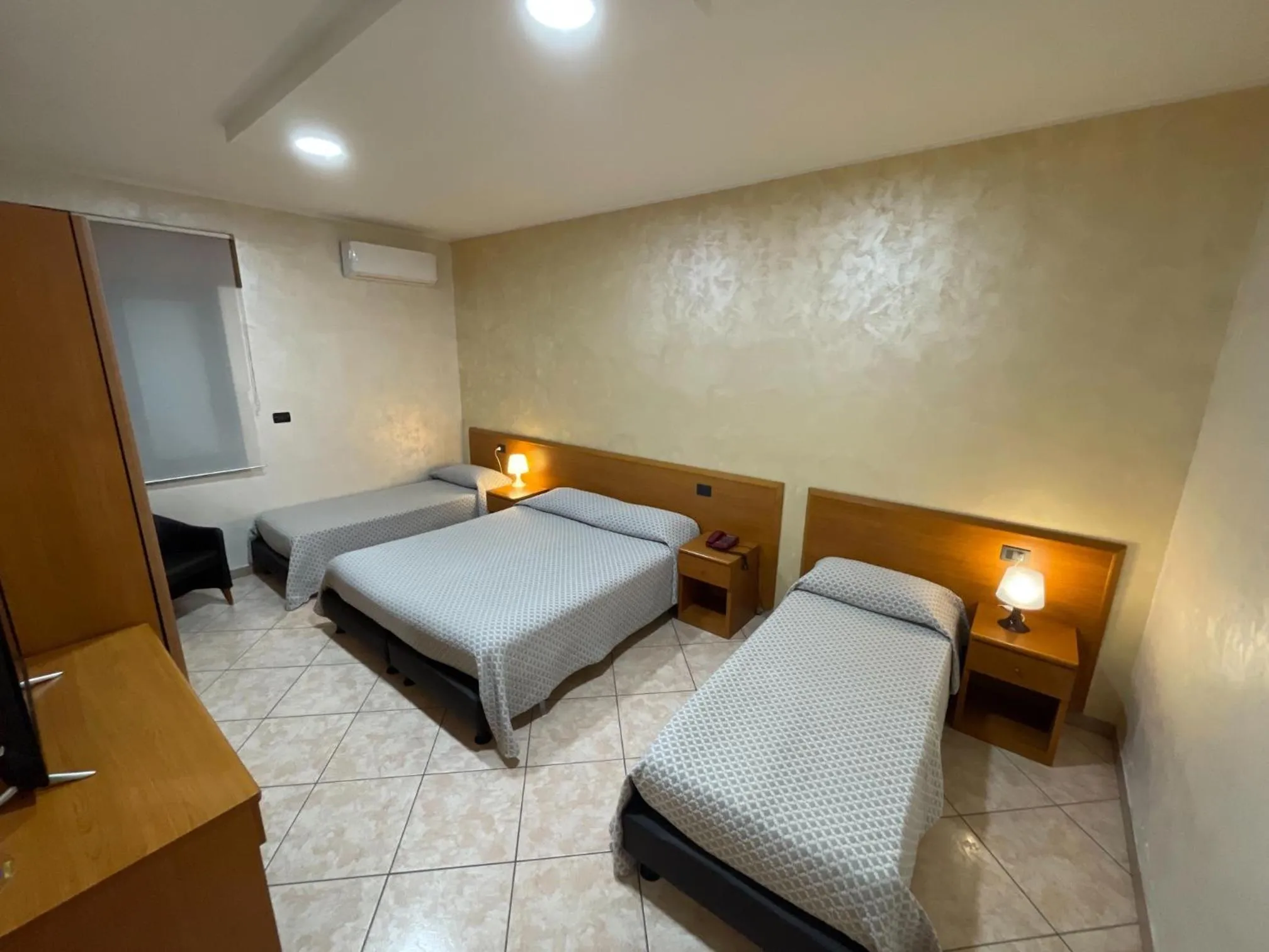 Bed in Hotel Toscano