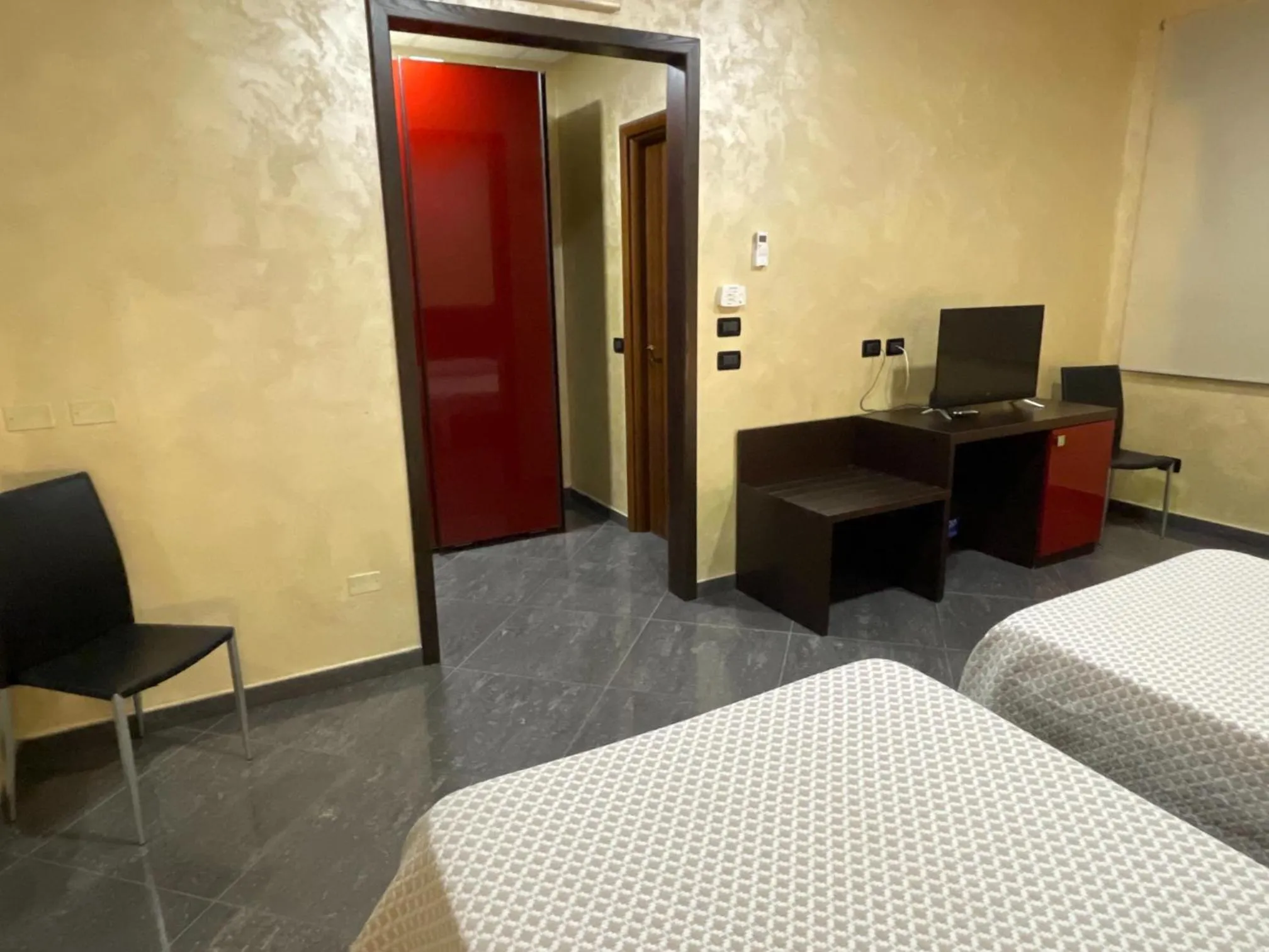 Bed in Hotel Toscano