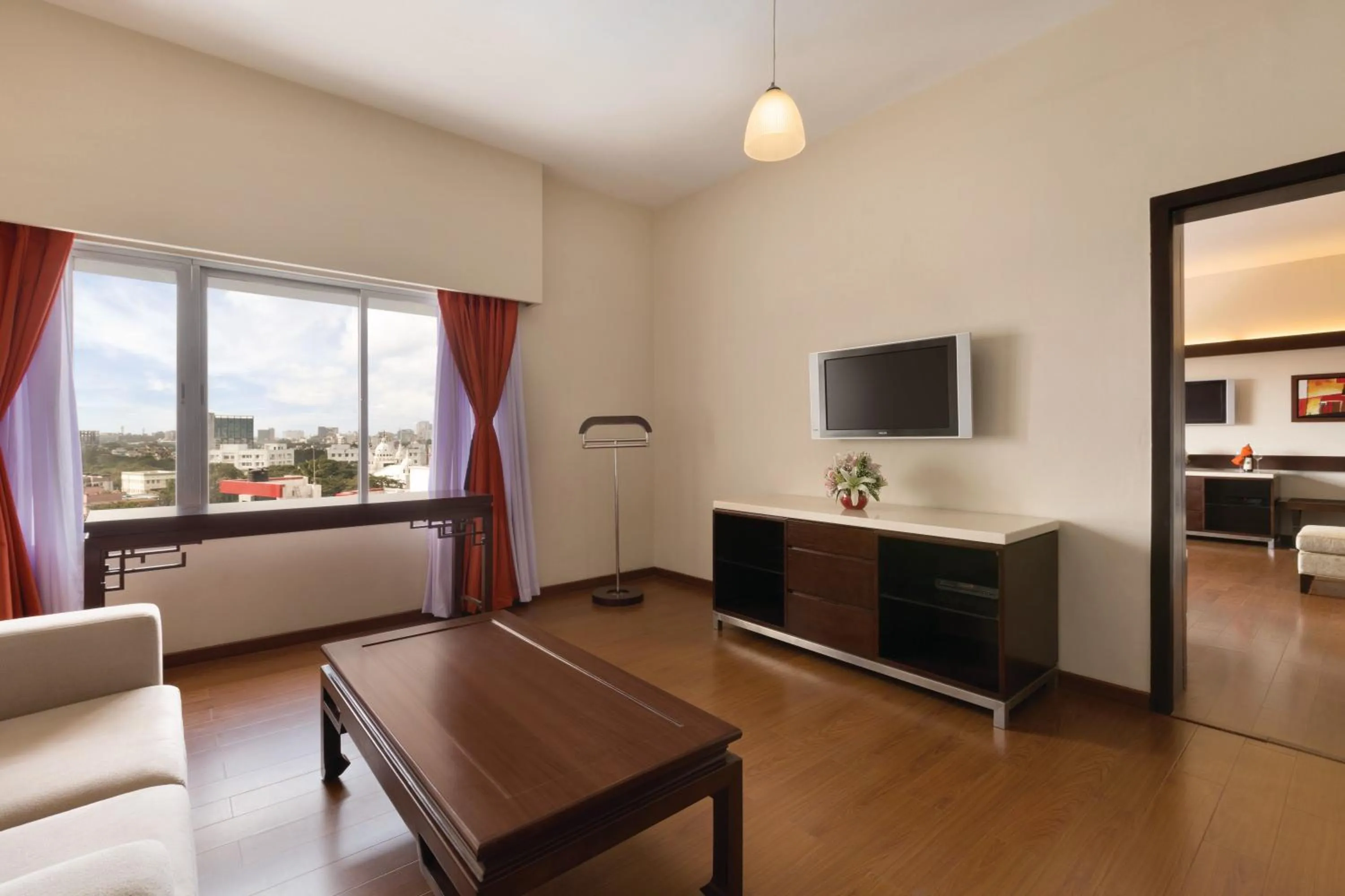 Living room in Ramada by Wyndham Chennai Egmore