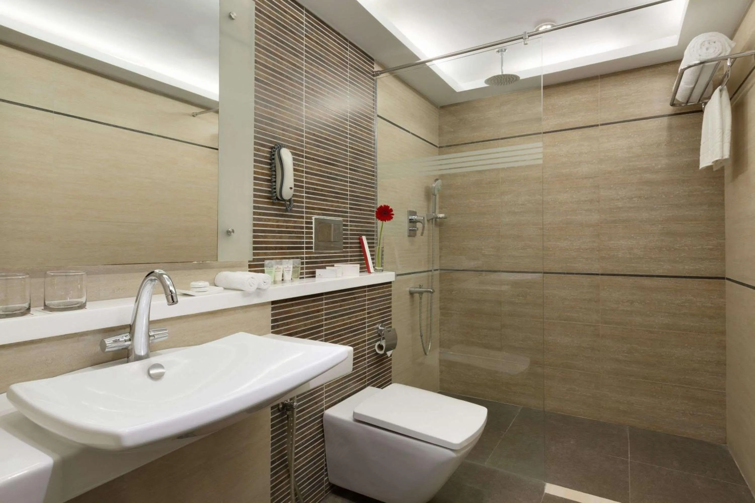 Bathroom in Ramada by Wyndham Chennai Egmore