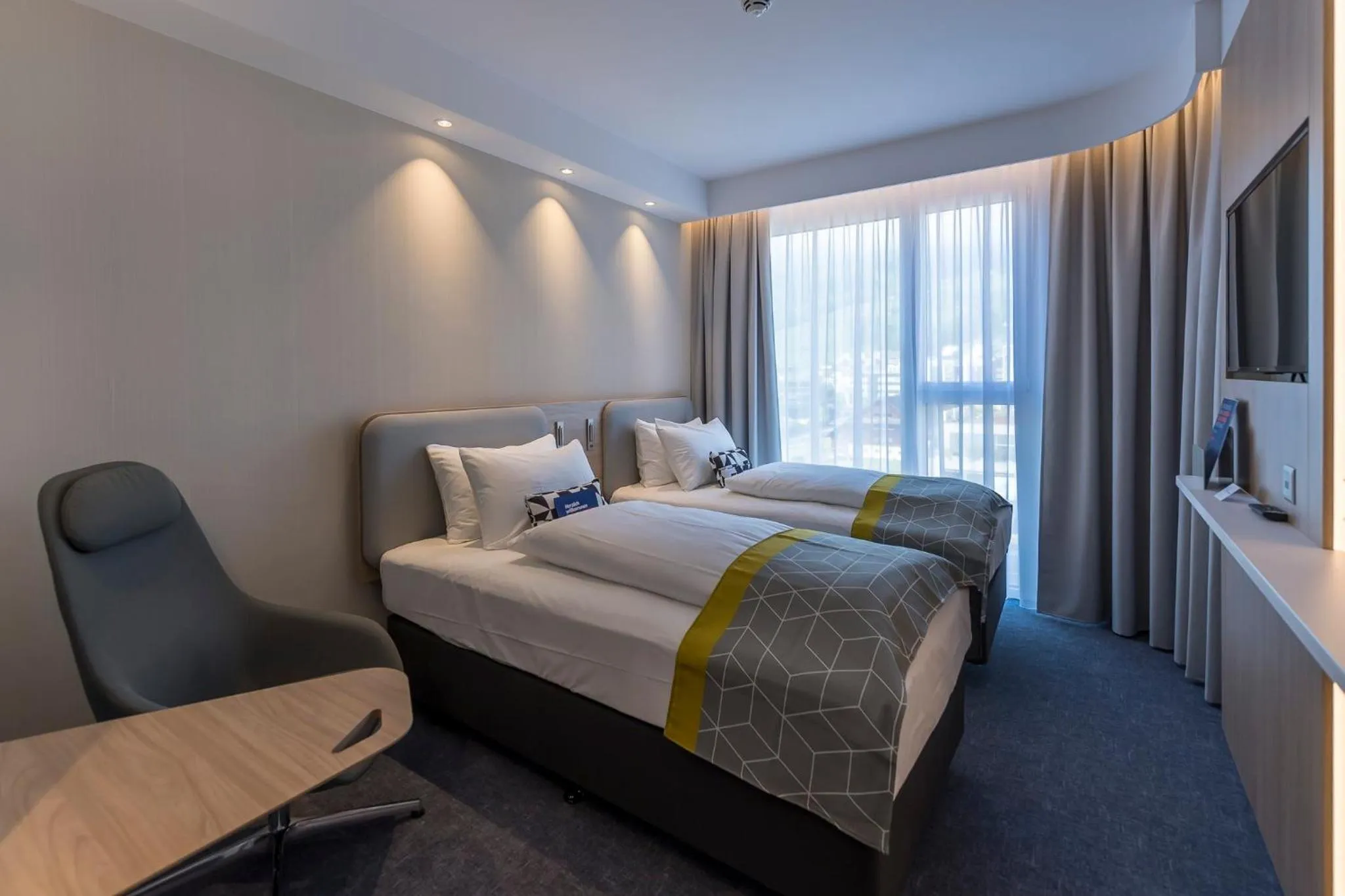 Photo of the whole room, Bed in Holiday Inn Express - Luzern - Kriens by IHG