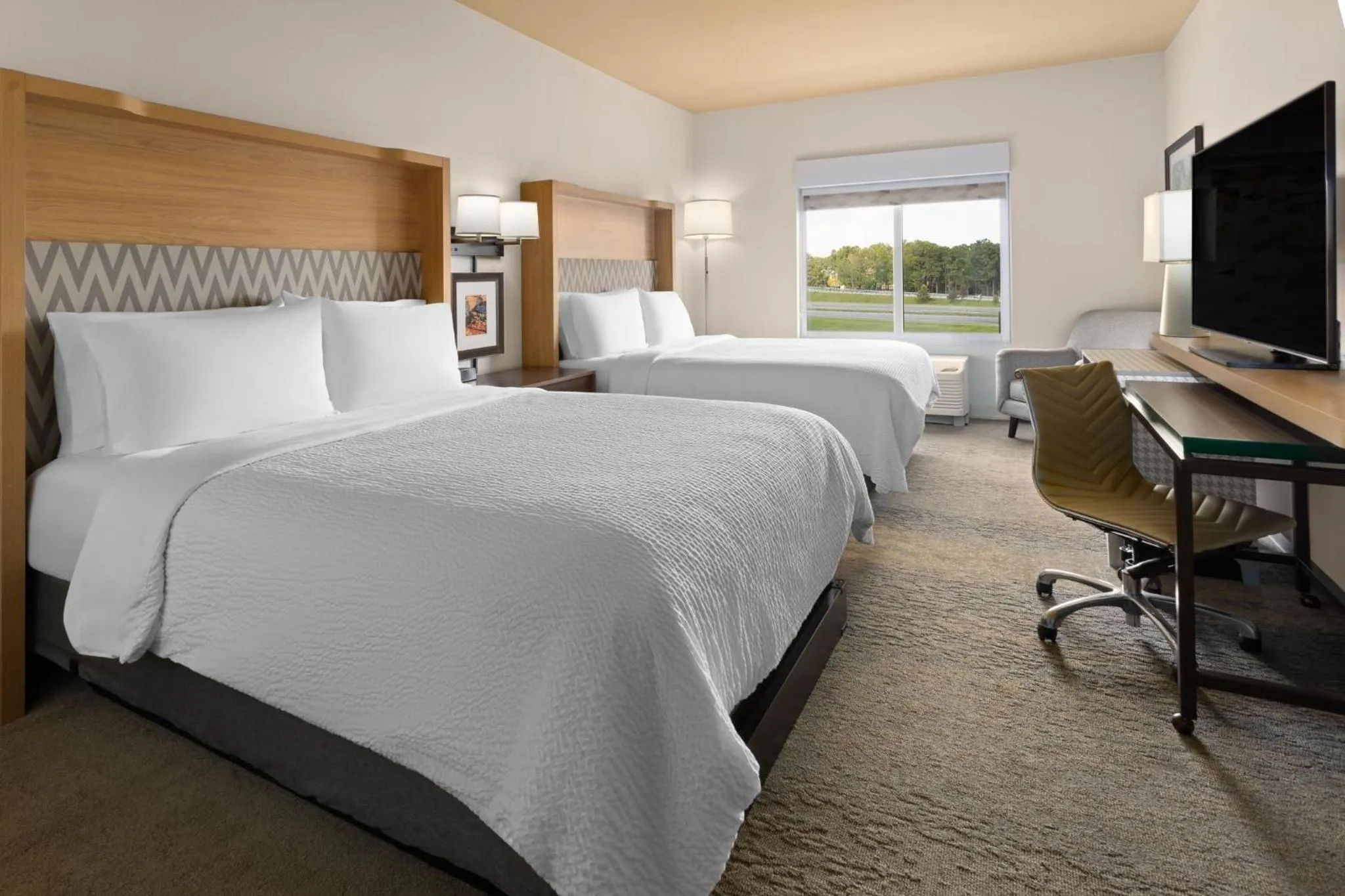 Photo of the whole room, Bed in Holiday Inn & Suites - Savannah Airport - Pooler by IHG