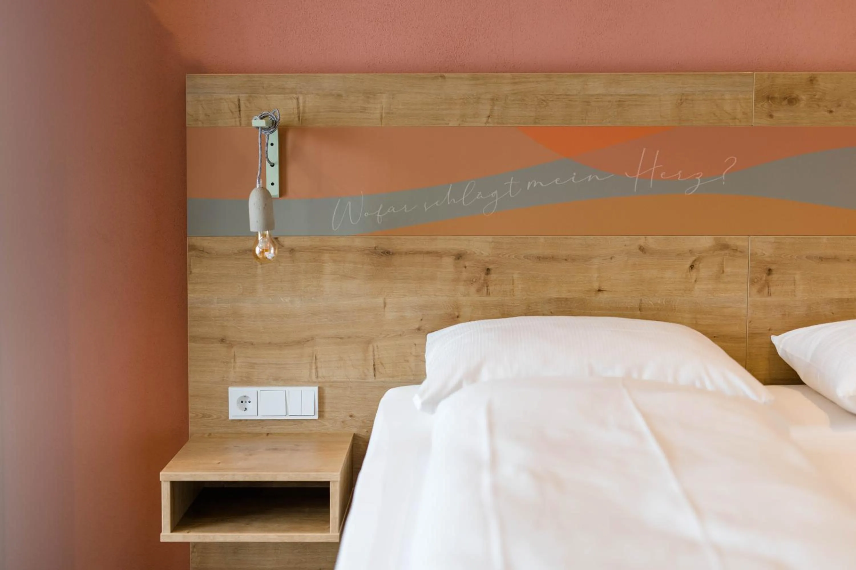 Bed in Stadthotel Freilassing