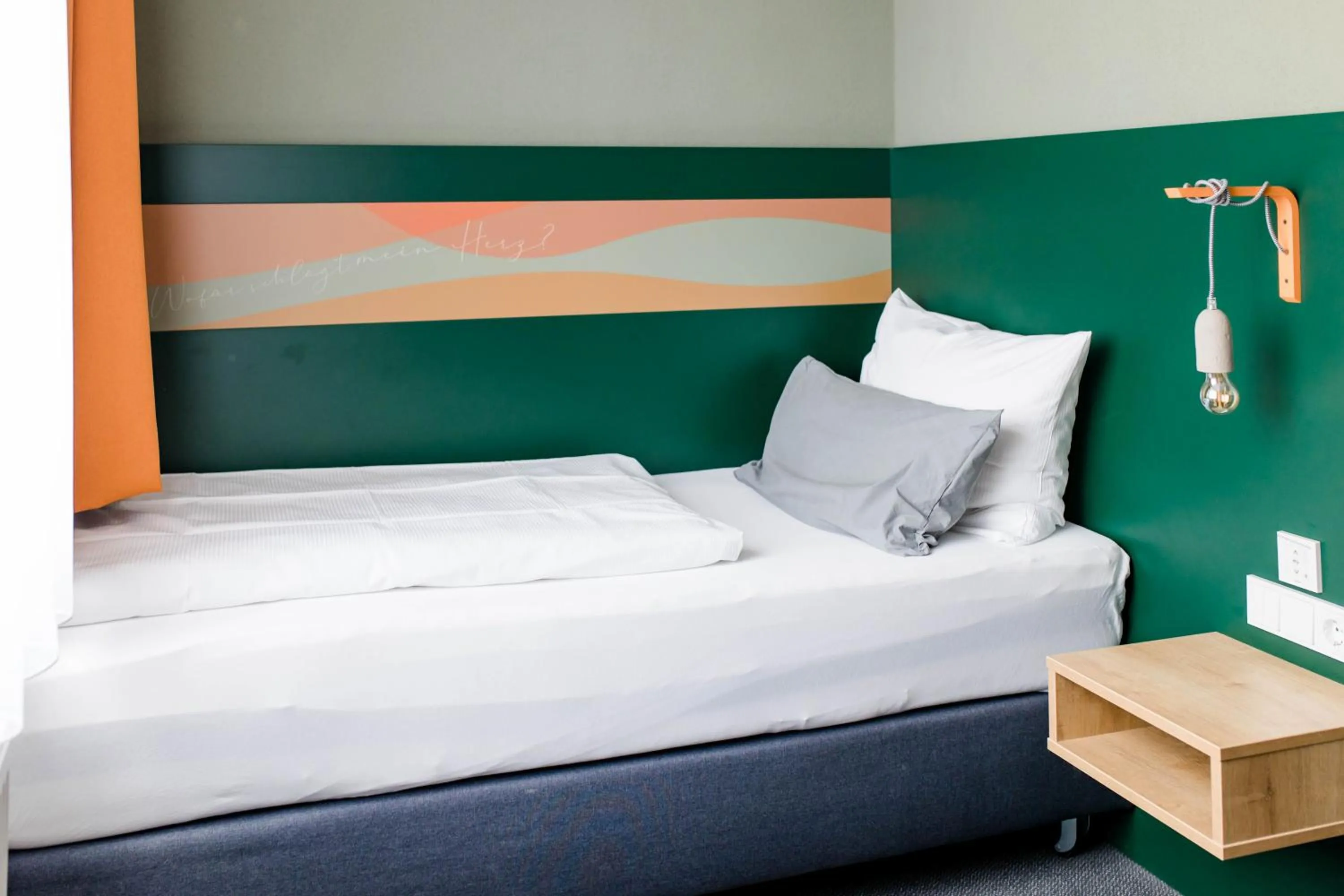 Bed in Stadthotel Freilassing