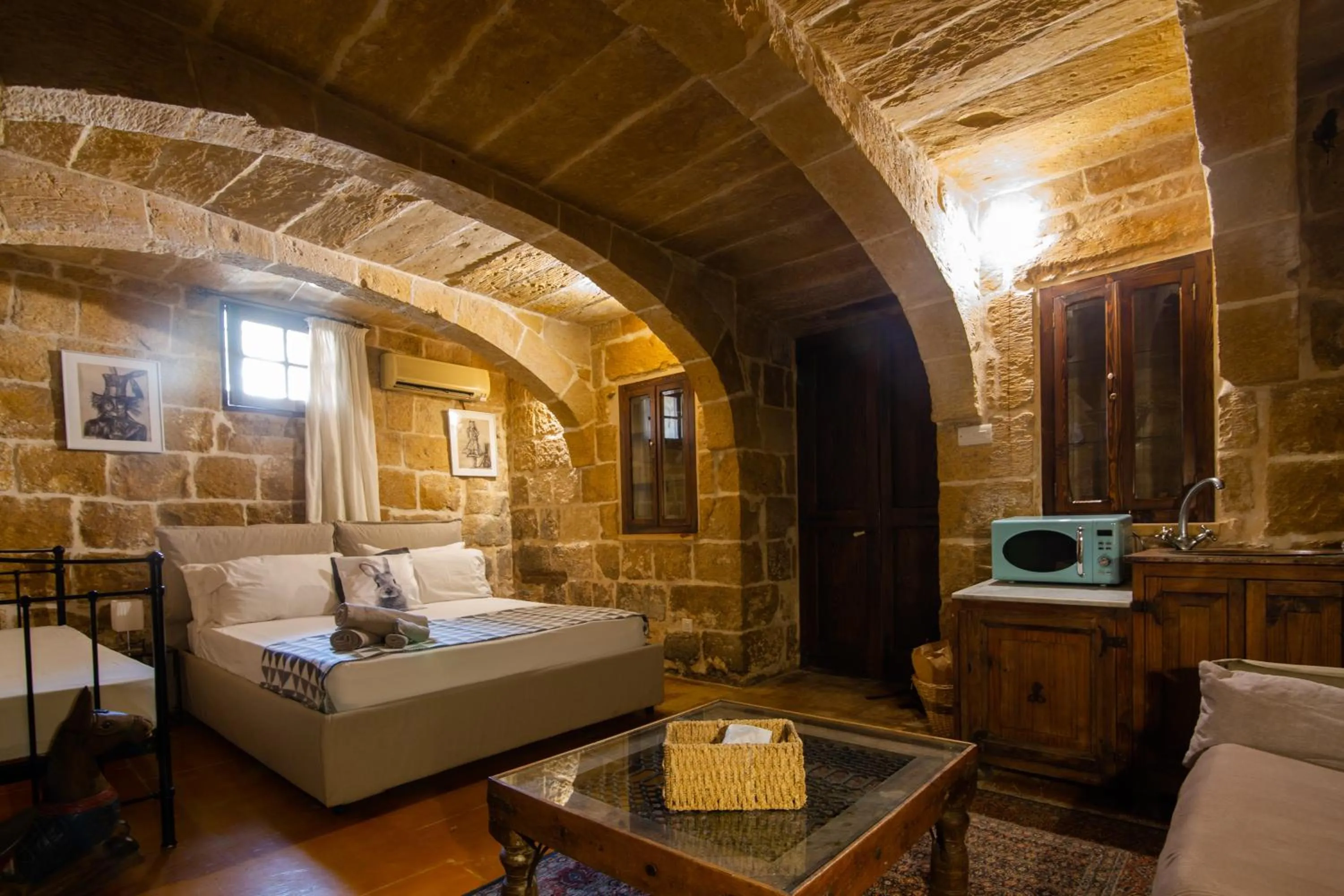 Bed in The Burrow Guest House