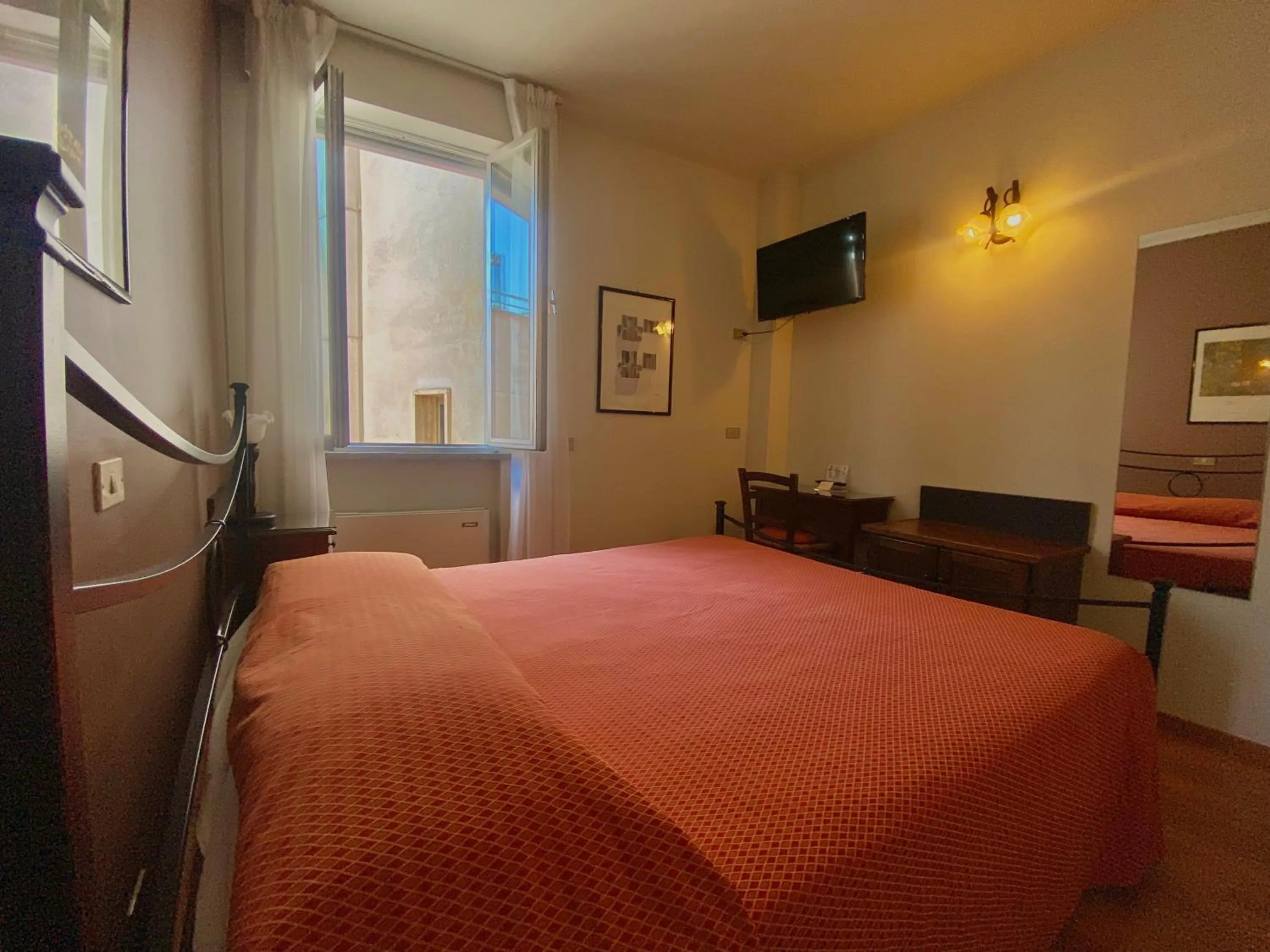 Bed in Hotel Rainero